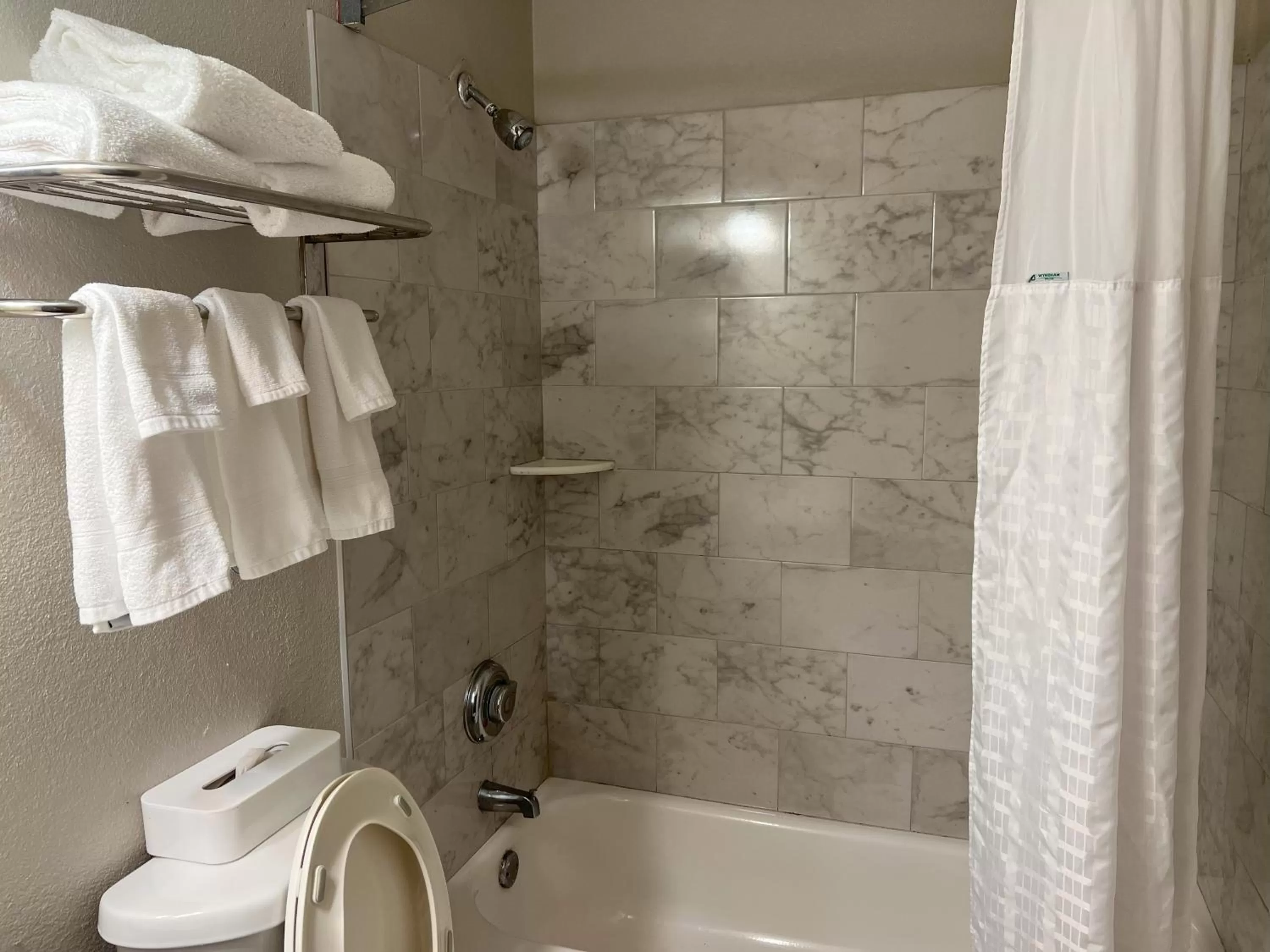 Bathroom in Days Inn by Wyndham Orange Park/Jacksonville