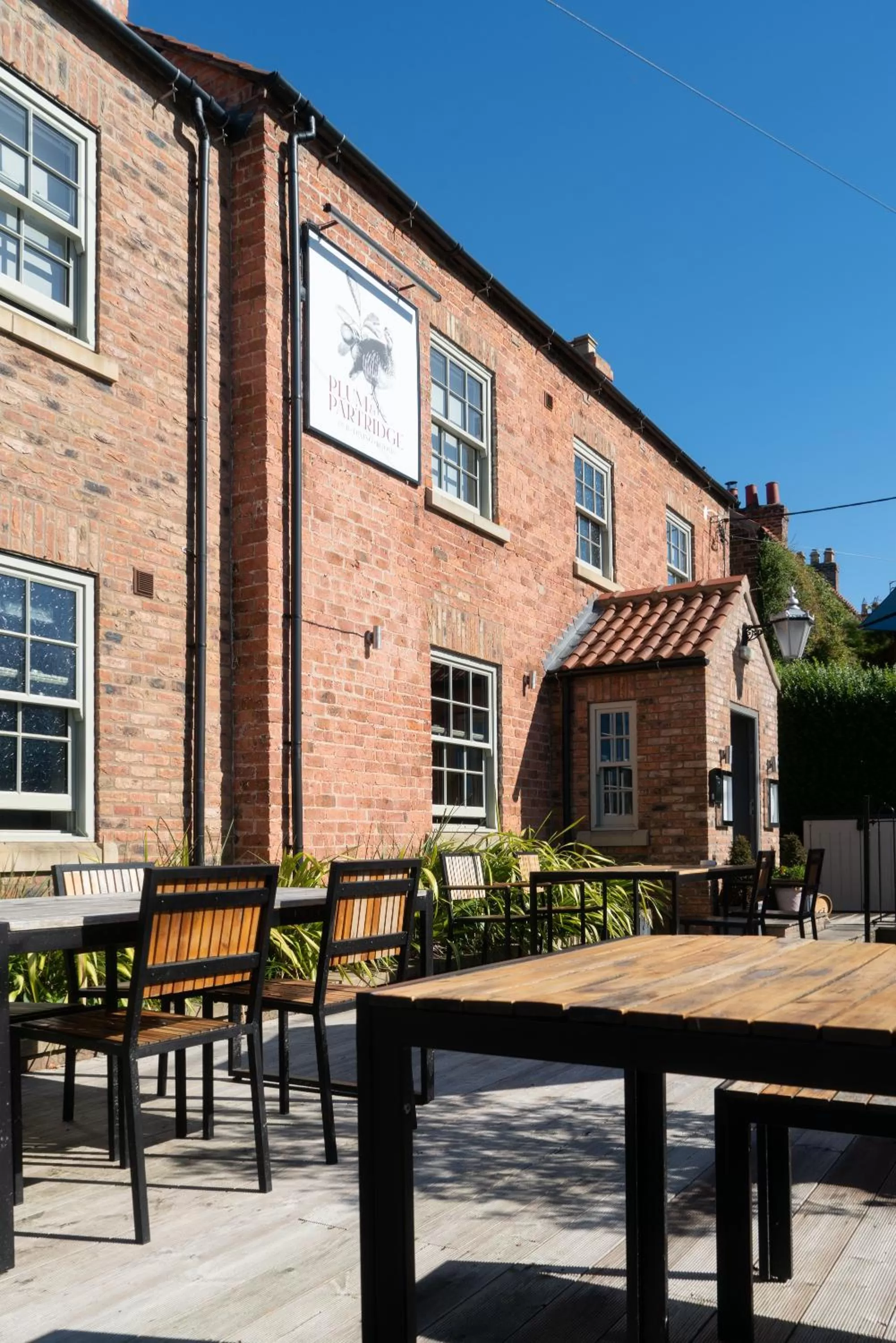 Property building in Plum and Partridge Husthwaite