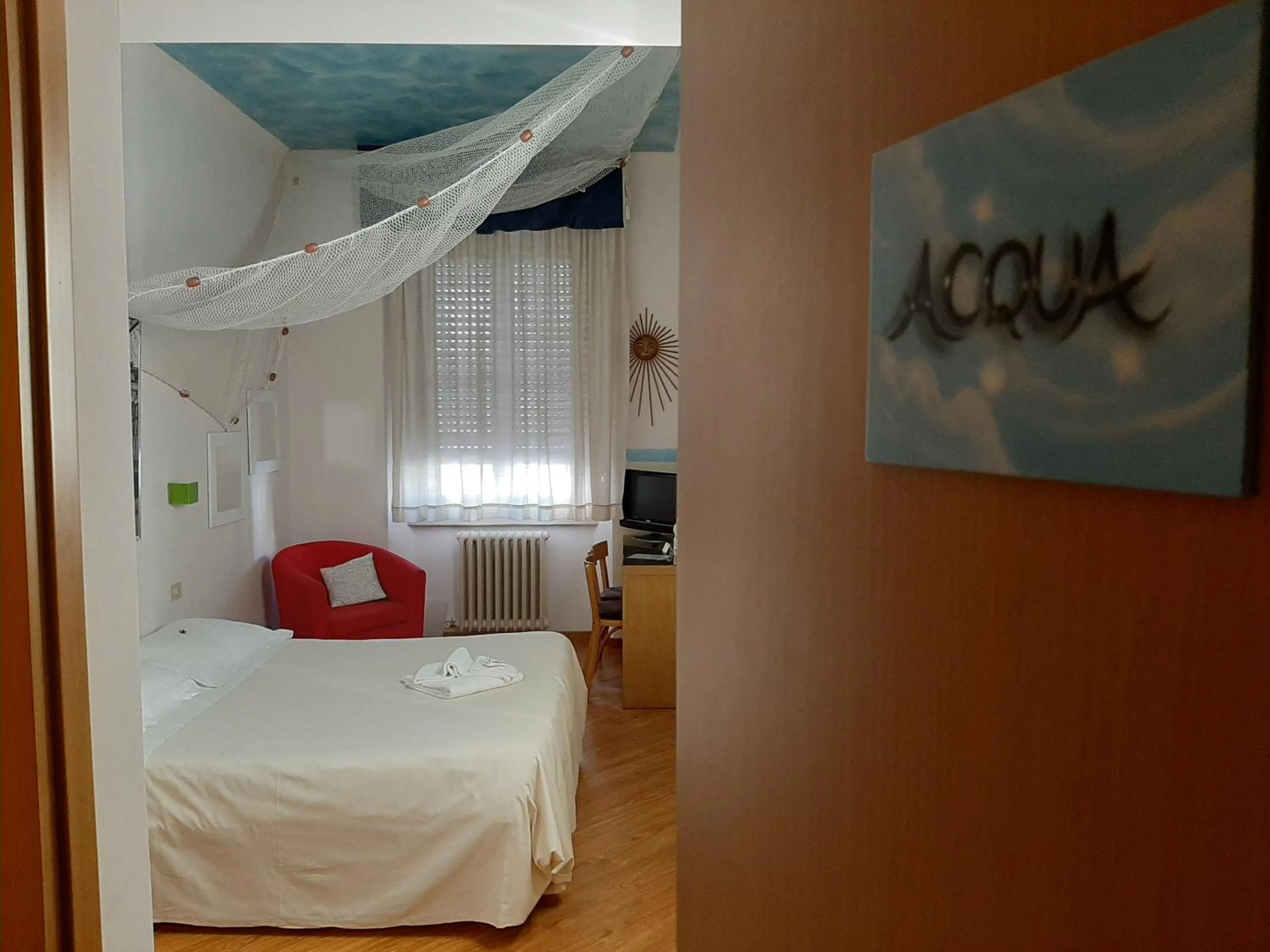 Bed in Il Girasole High Quality Inn