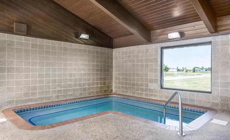 Swimming pool in AmericInn by Wyndham Grafton