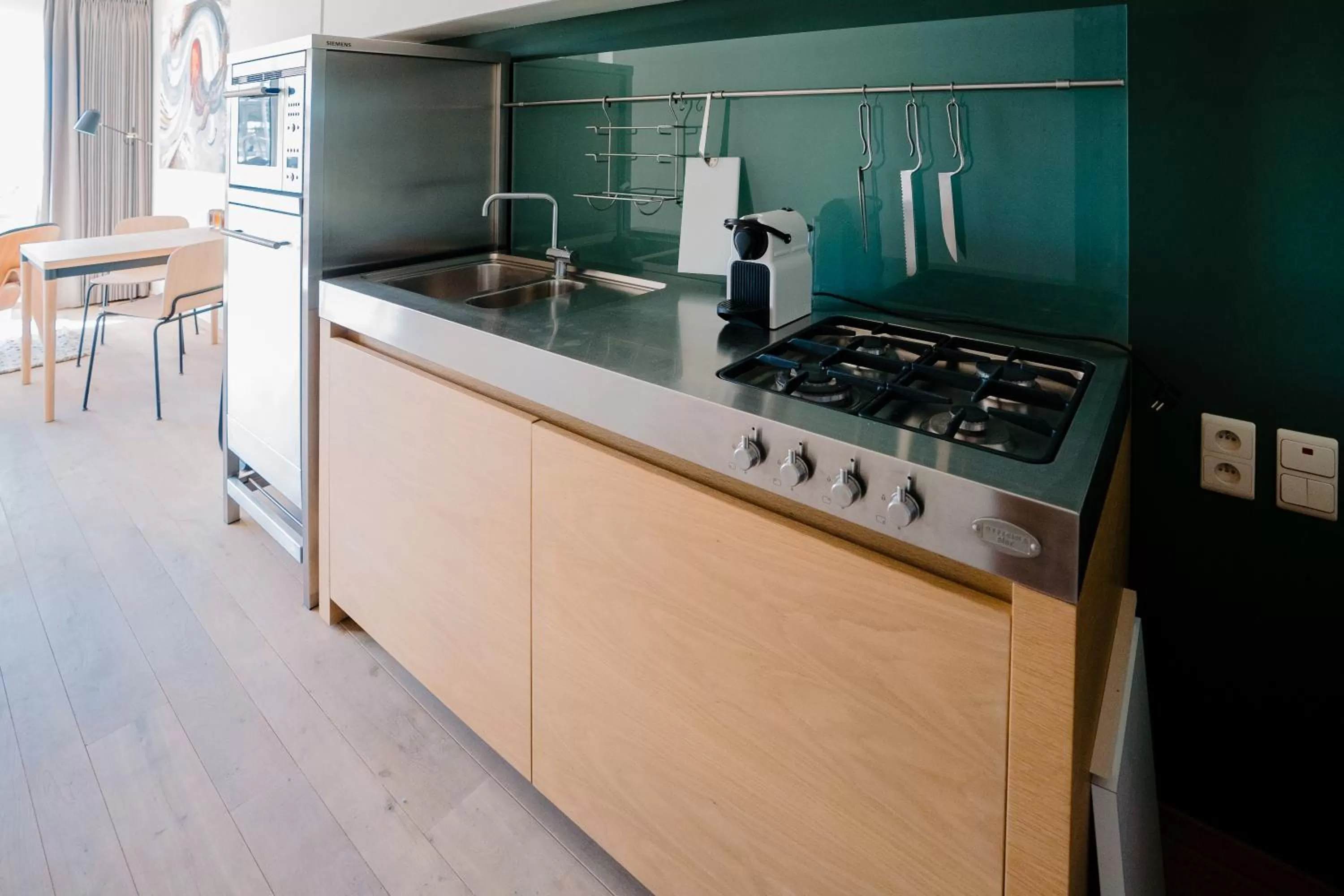 Kitchen or kitchenette in Hotel du Bassin