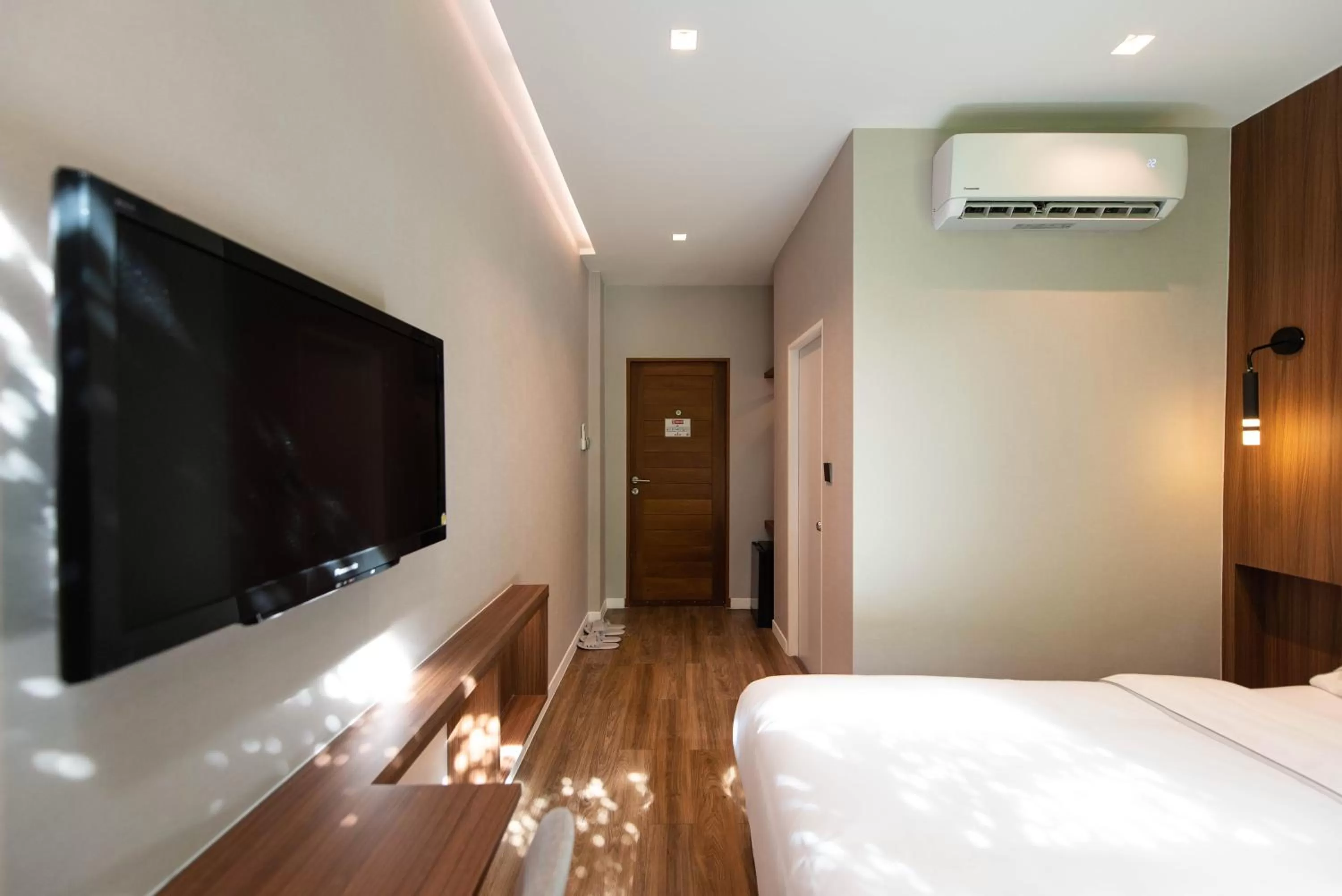 TV and multimedia, Bed in Botanic Service Room at Impact Muangthongthani - SHA Certified