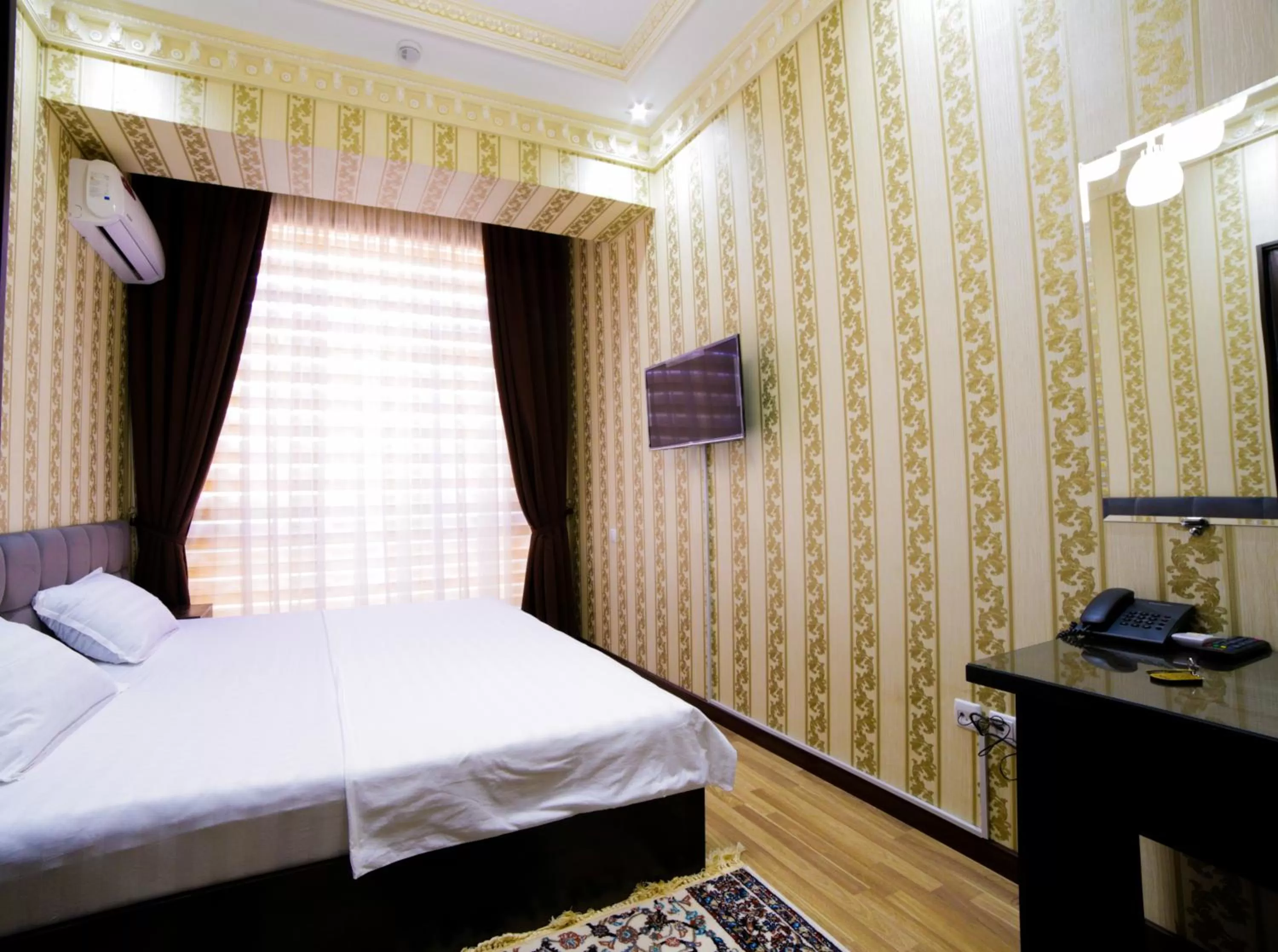 Bed in Alliance Hotel Tashkent