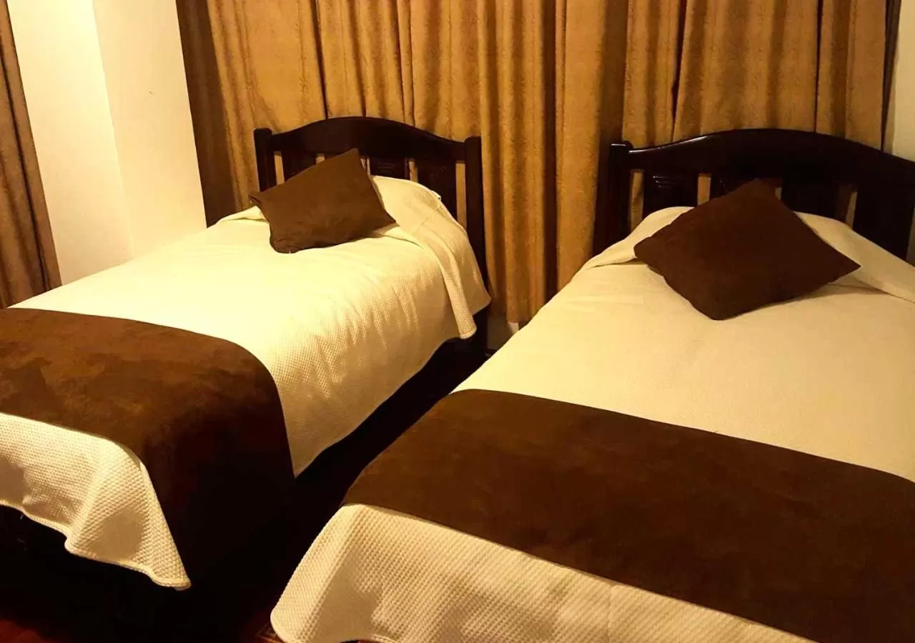 Photo of the whole room, Bed in La Merced Plaza Hospedaje