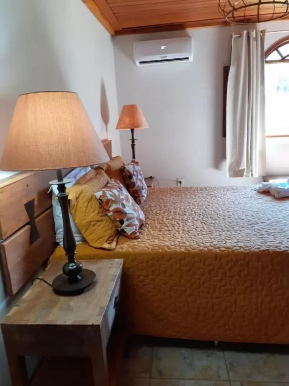 Bed in POUSADA CHARLOTTE