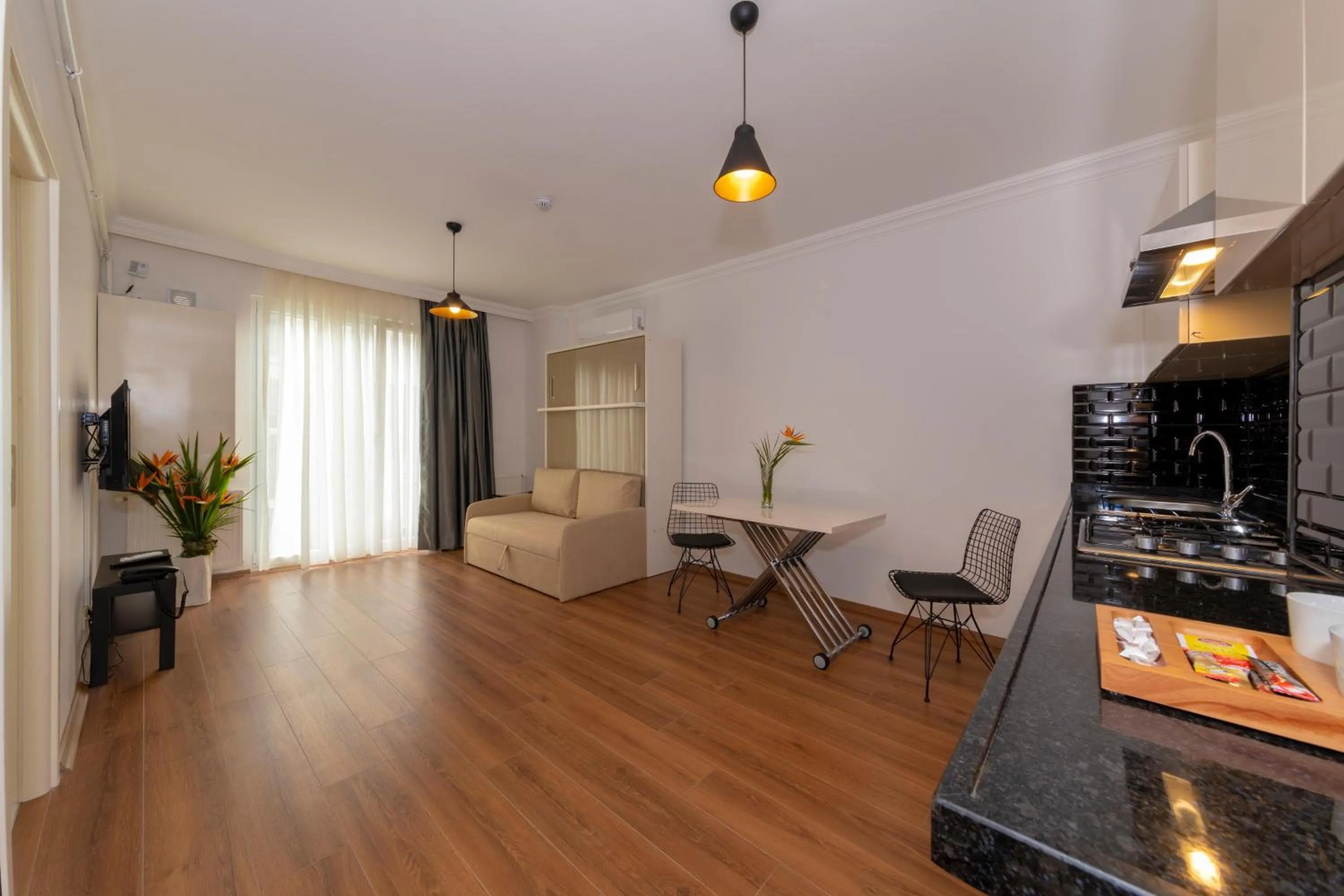 Kitchen or kitchenette in Joy Suites