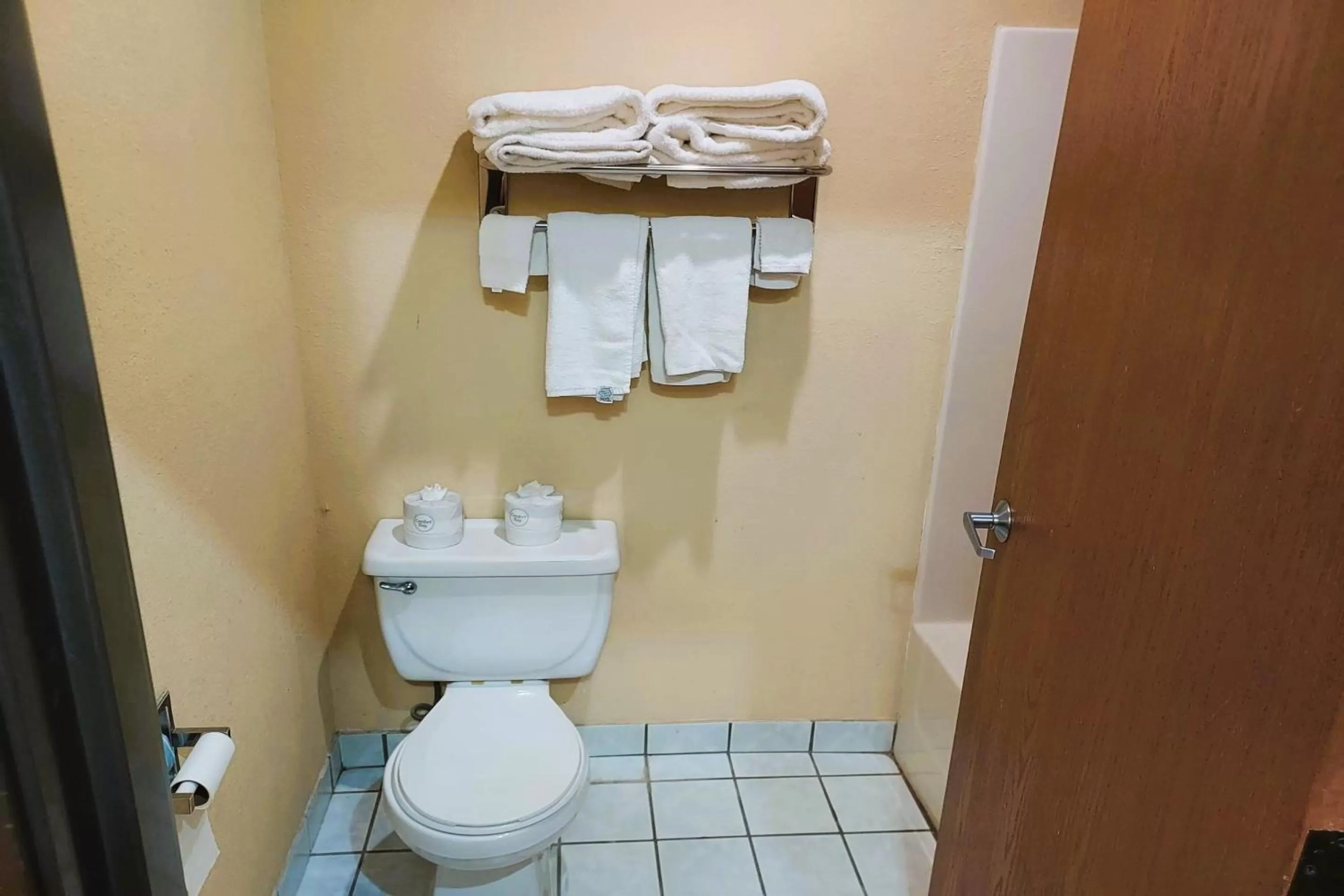 Bathroom in McPherson Inn By OYO, I-135