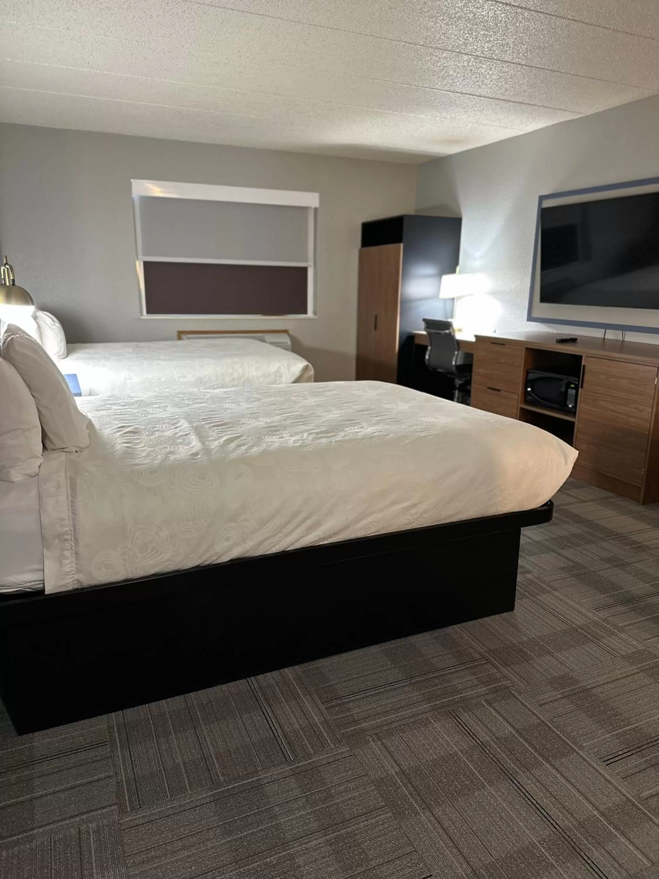 Photo of the whole room, Bed in AmericInn by Wyndham Monroe