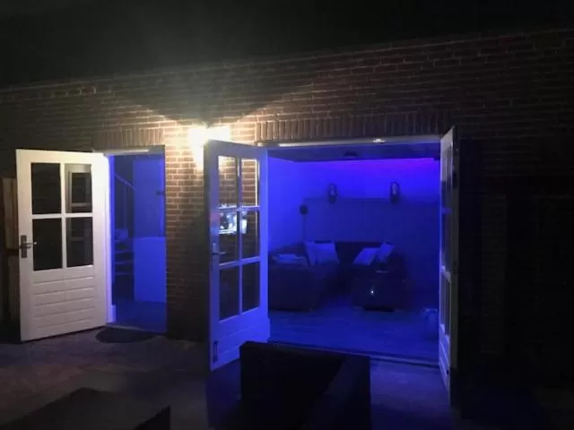 Communal lounge/ TV room in Villa Pats