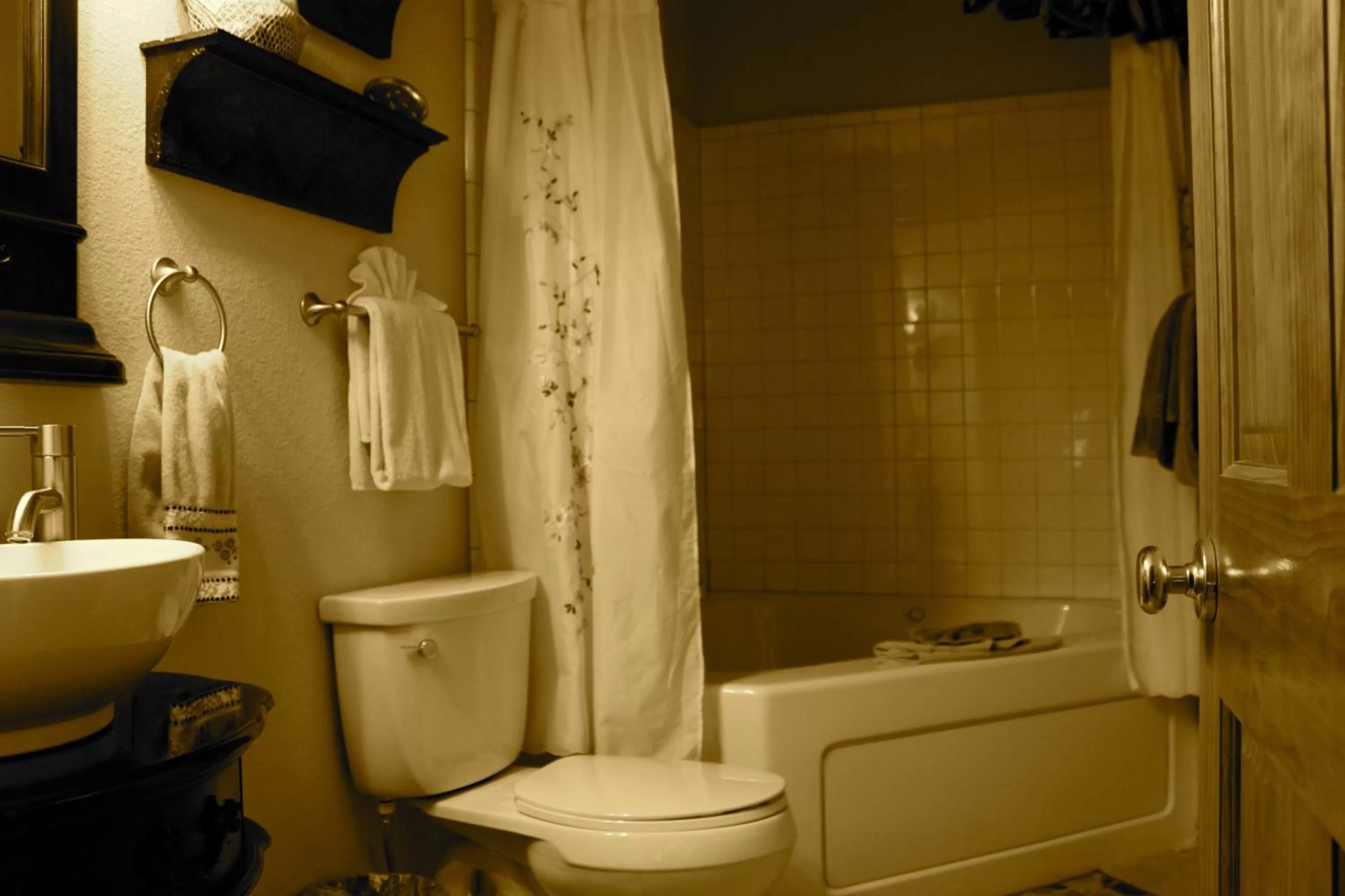 Bathroom in All Seasons Inn