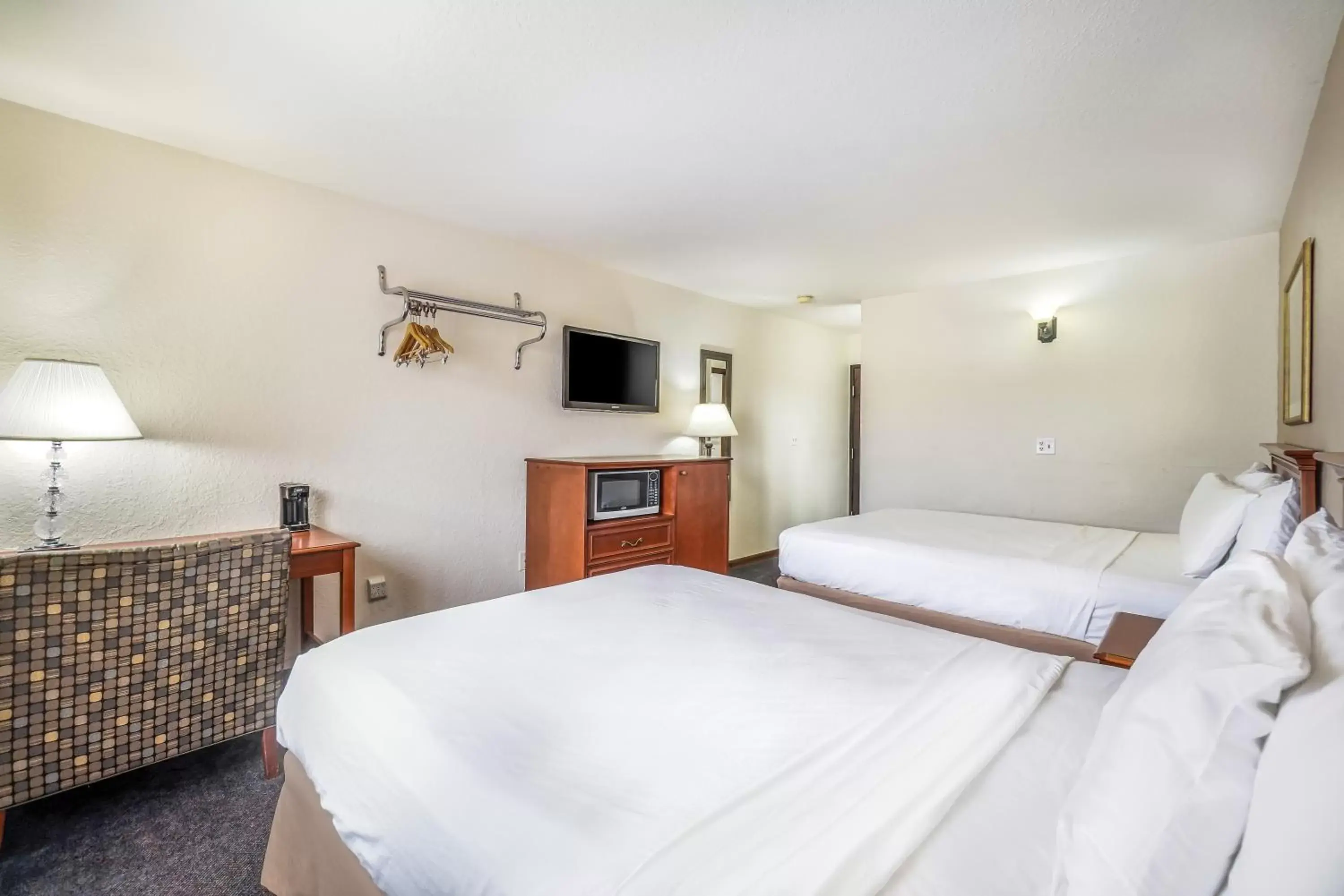 Queen Room with Two Queen Beds - Non-Smoking in Americas Best Value Inn Marquette Queen Room with Two Queen Beds - Non-Smoking in Americas Best Value Inn Marquette