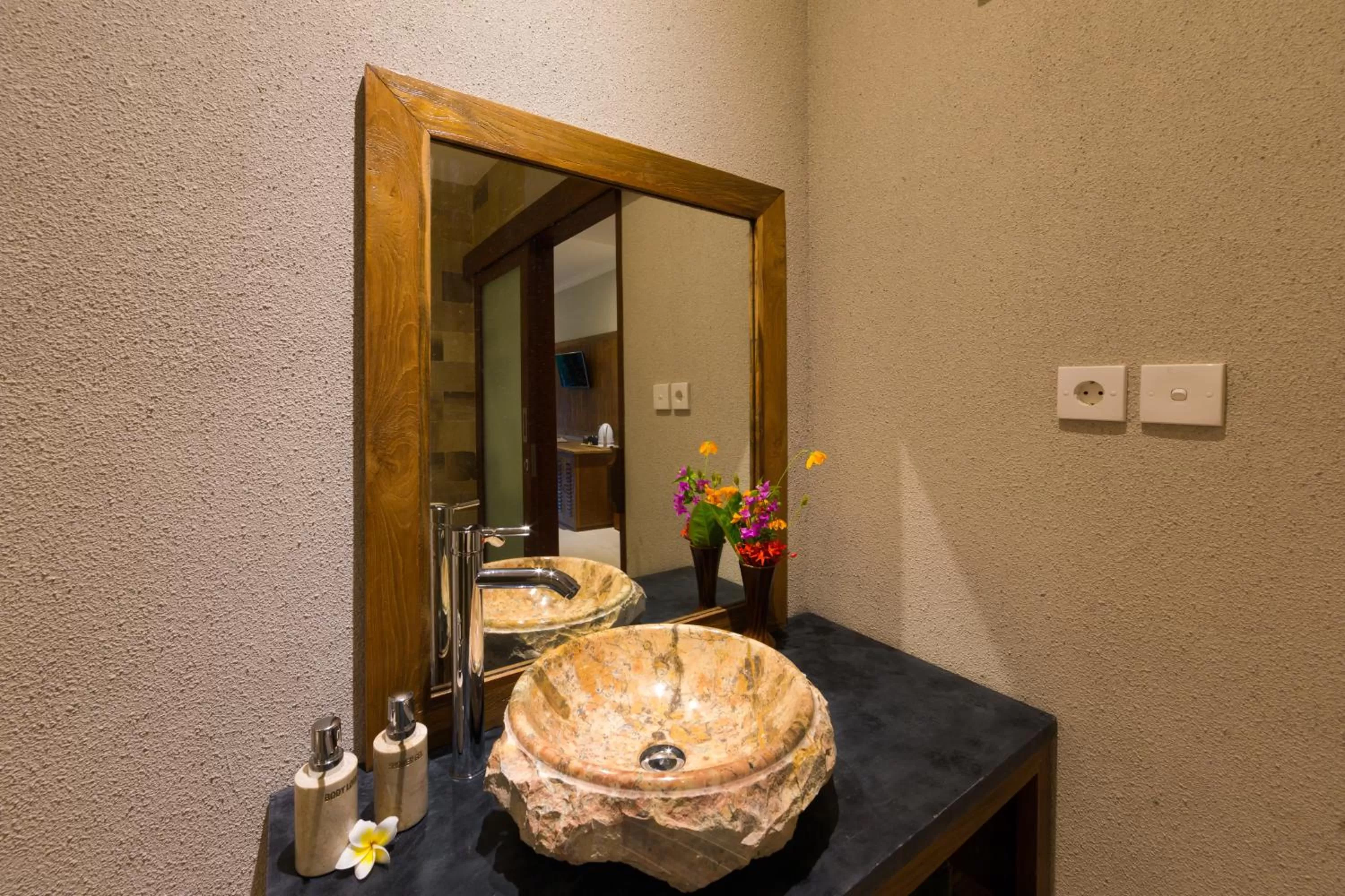 Bathroom in Alamdini Resort Ubud
