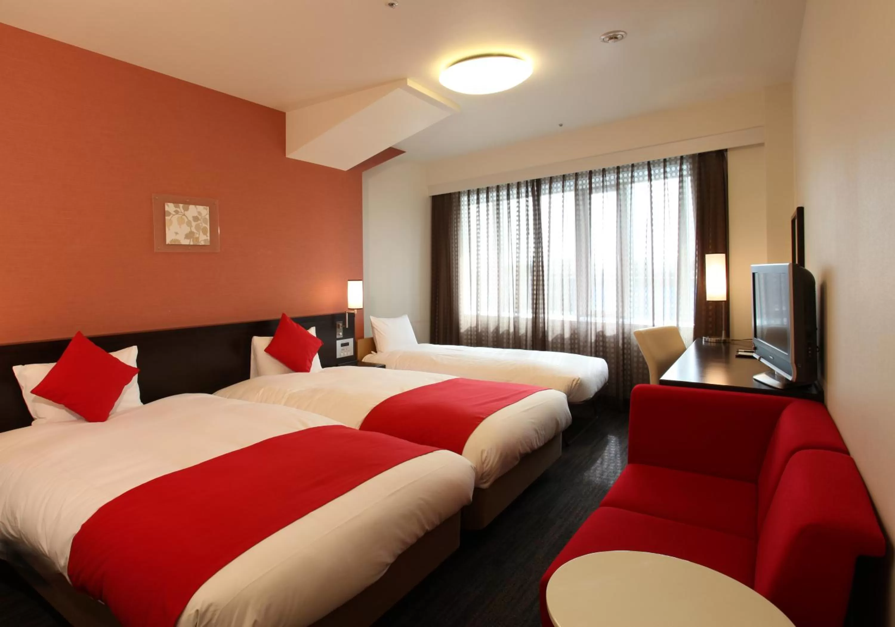 Bed in Daiwa Roynet Hotel Okayama Ekimae