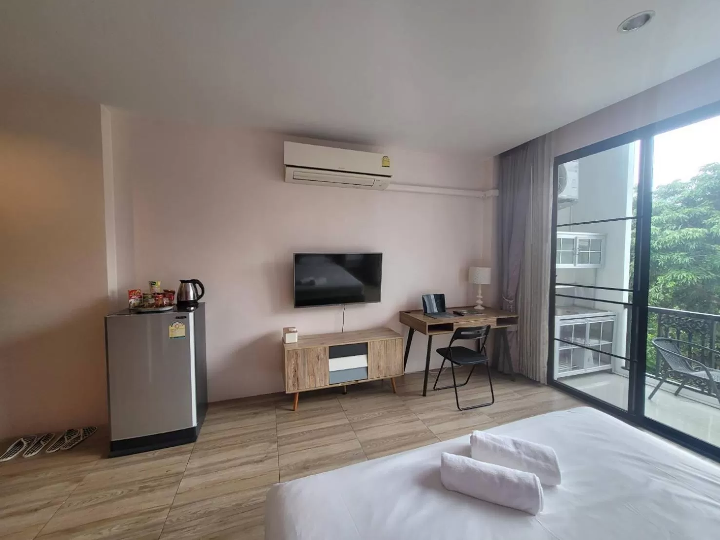 Photo of the whole room, TV/Entertainment Center in THAI HOTEL CHIANGMAI