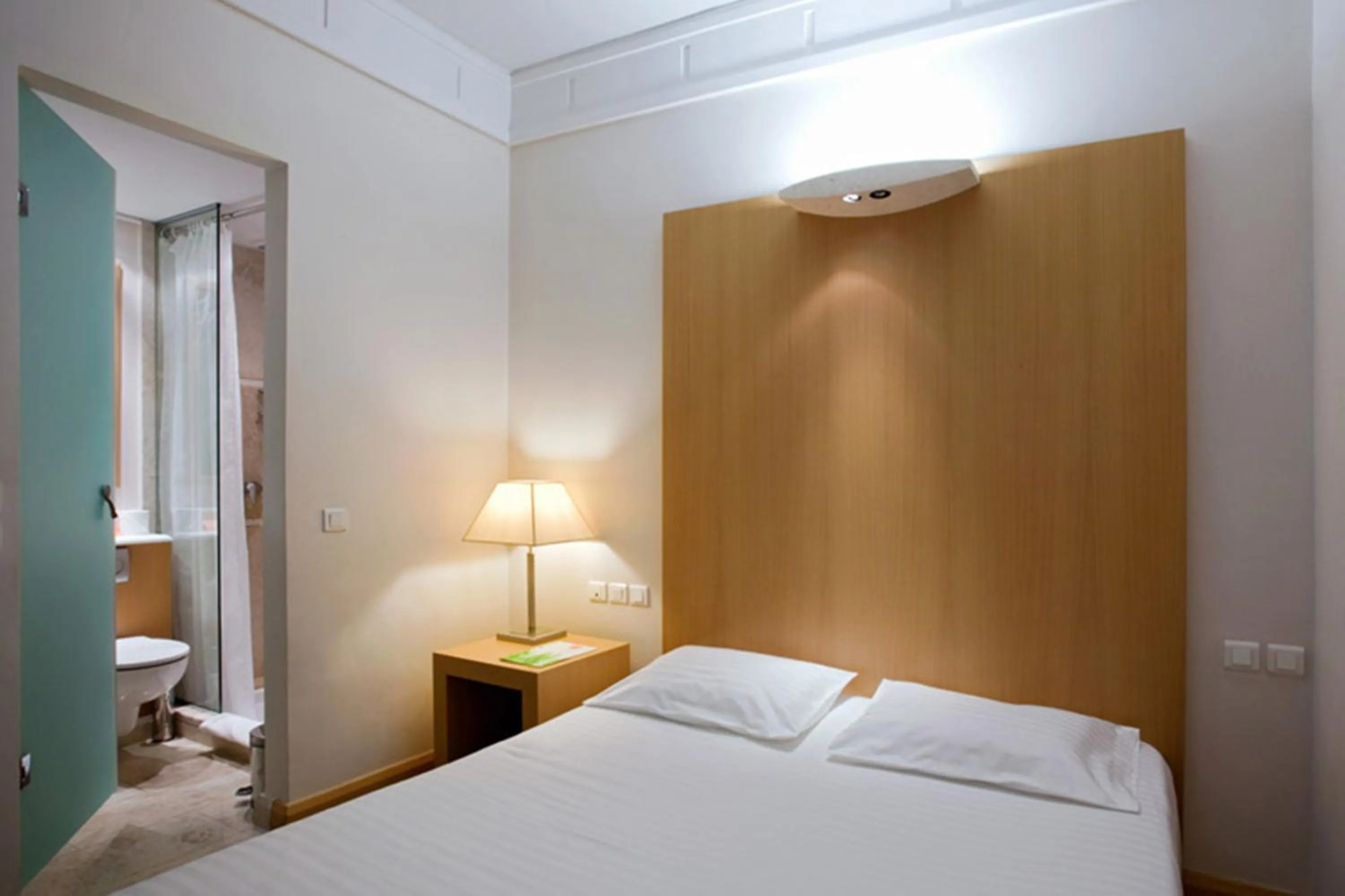 Bed in Central Hotel