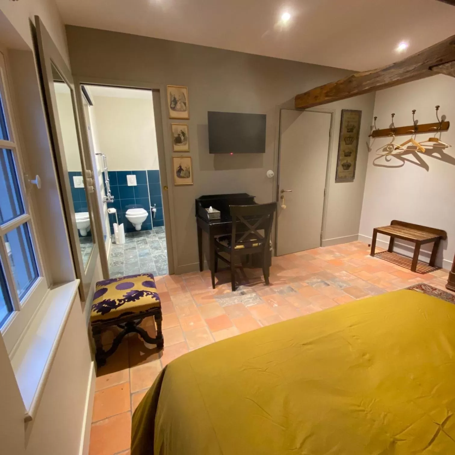 Bed, Seating Area in La Gironnerie