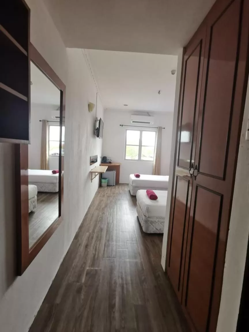 Bed in THE ZULEY HERITAGE HOTEL