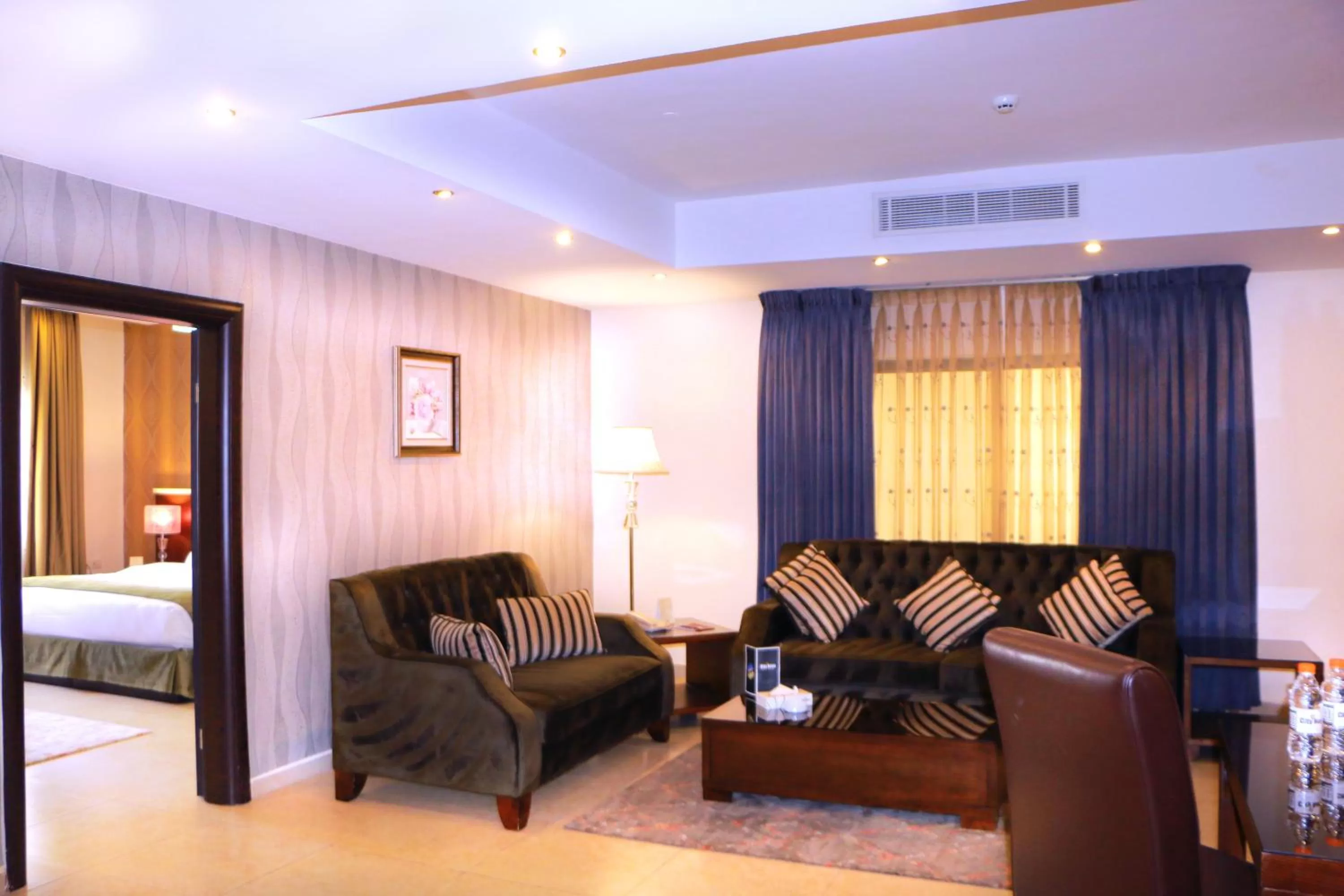 Bed in City Rose Hotel Suites