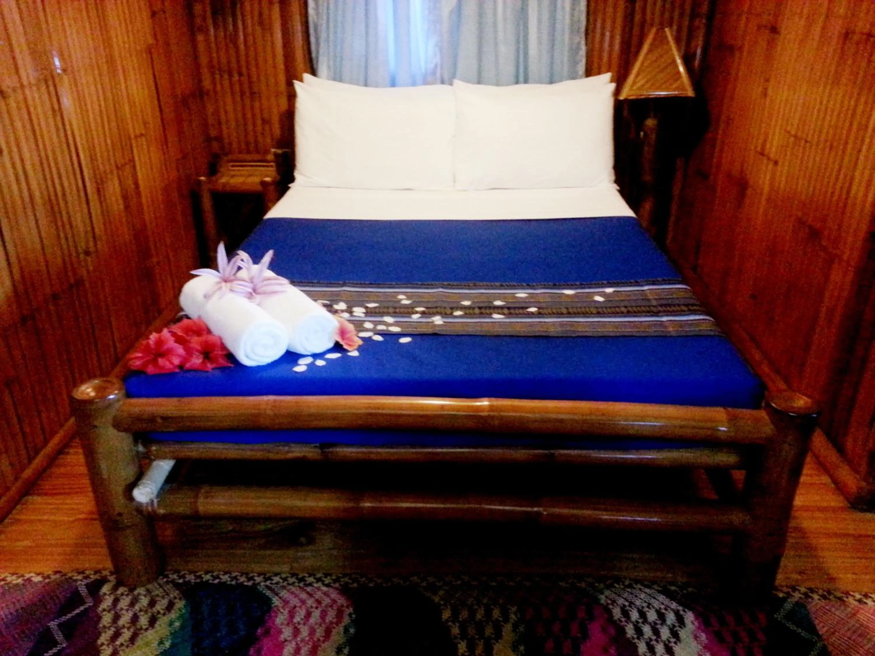 Bed in Hof Gorei Beach Resort Davao