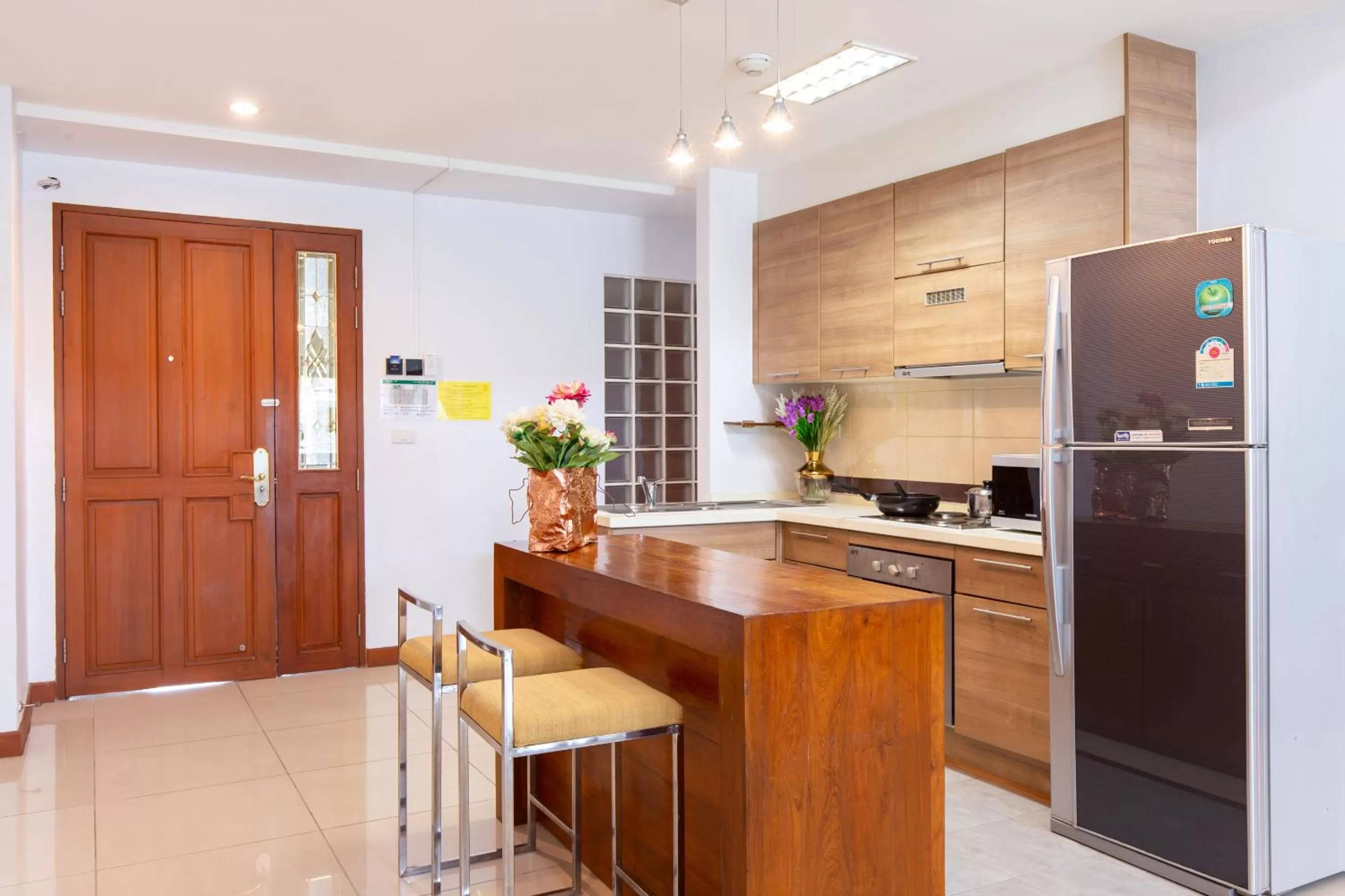 Kitchen or kitchenette in Lasalle Suites Hotel & Residence