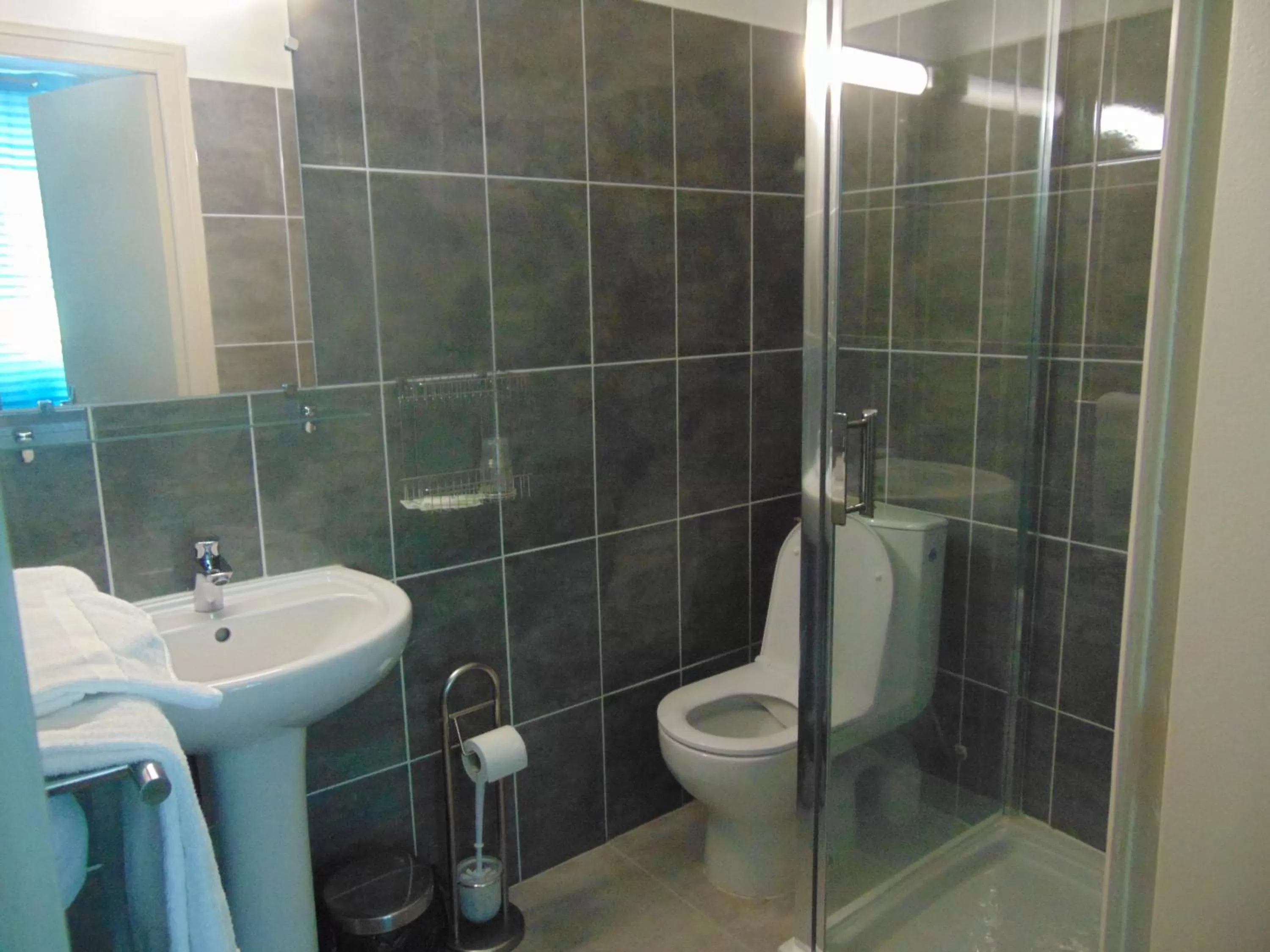 Bathroom in Le Relais de la RN7