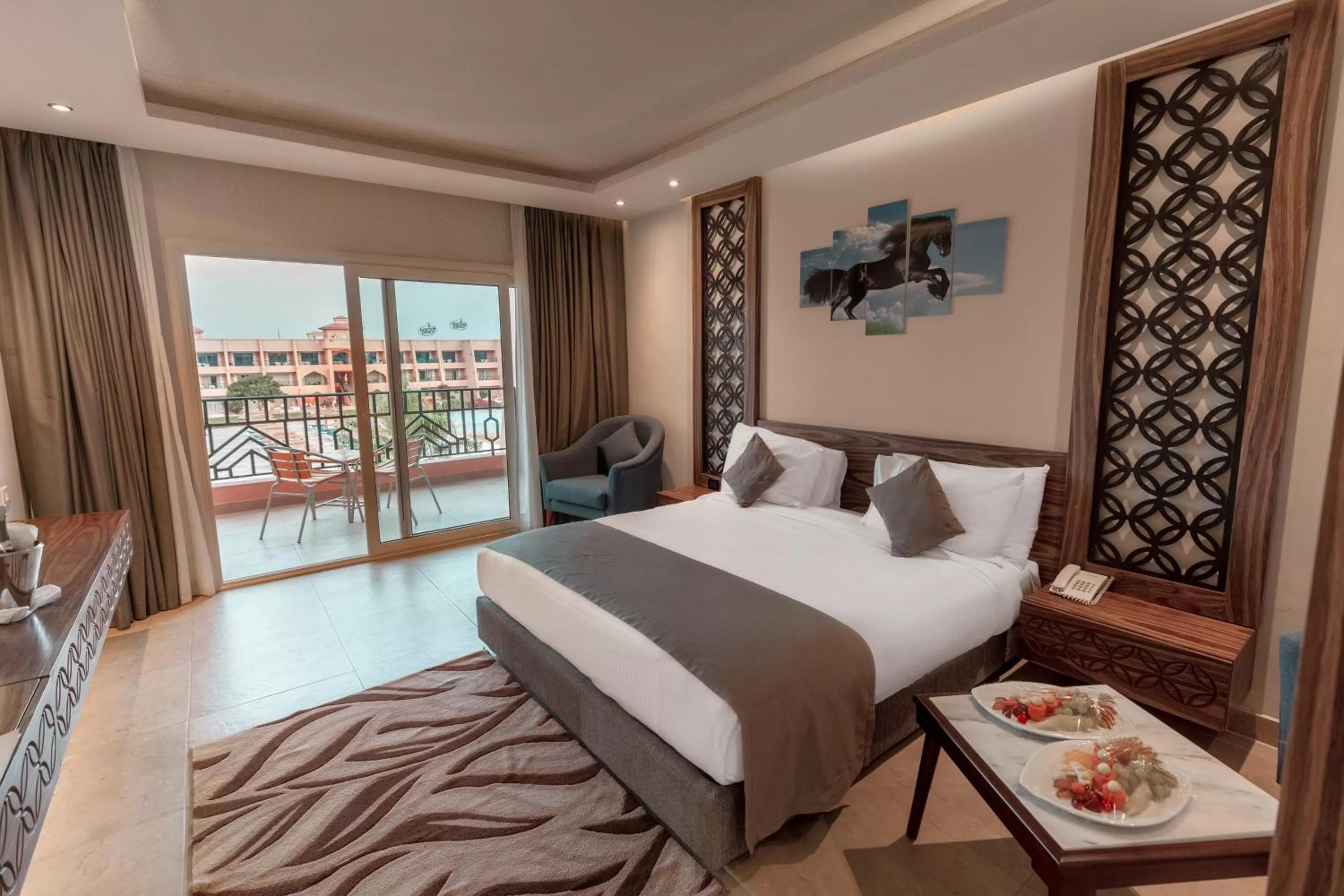 Balcony/Terrace, Bed in Jasmine Palace Resort