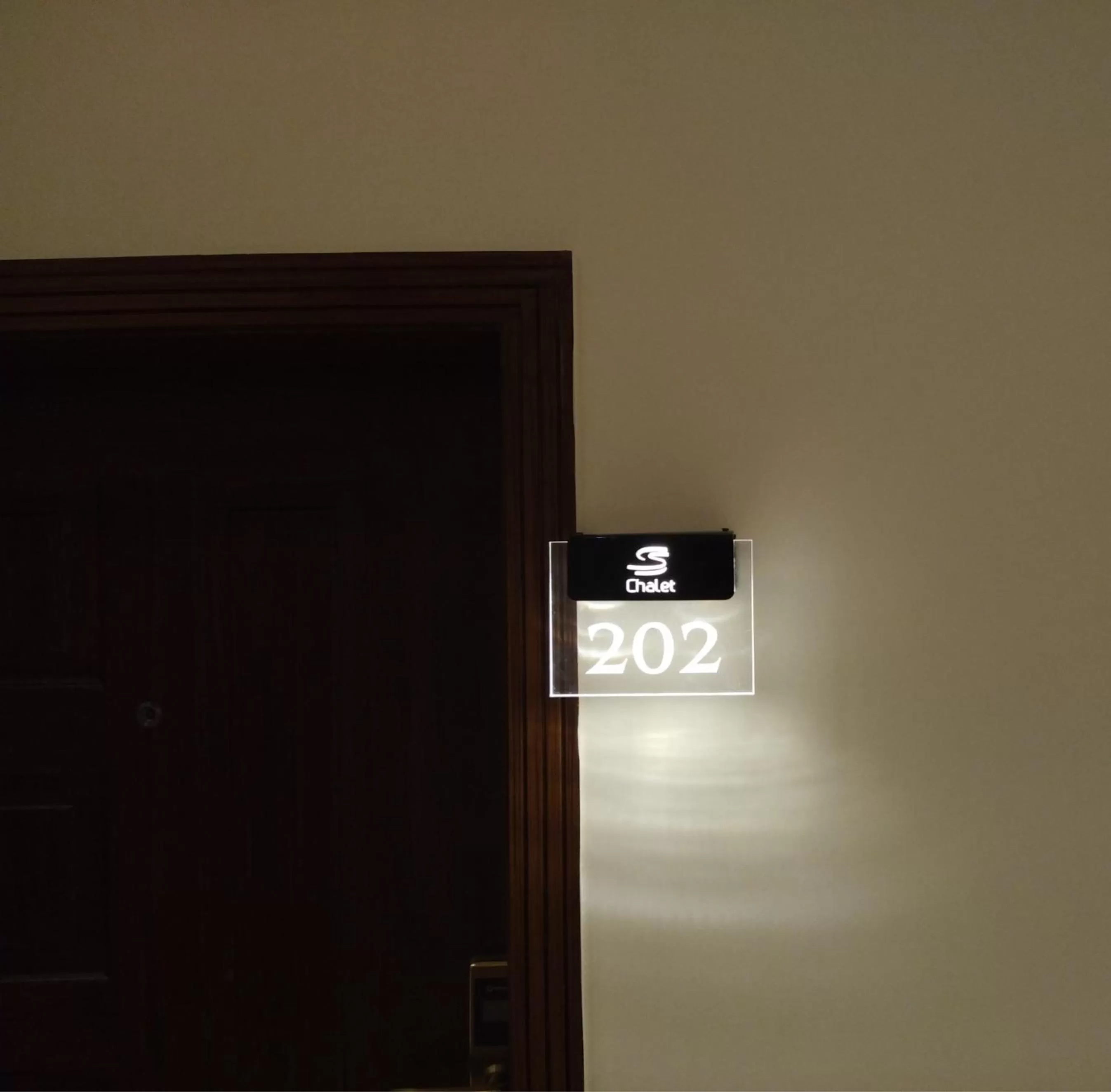 Property logo or sign in S Chalet Multan