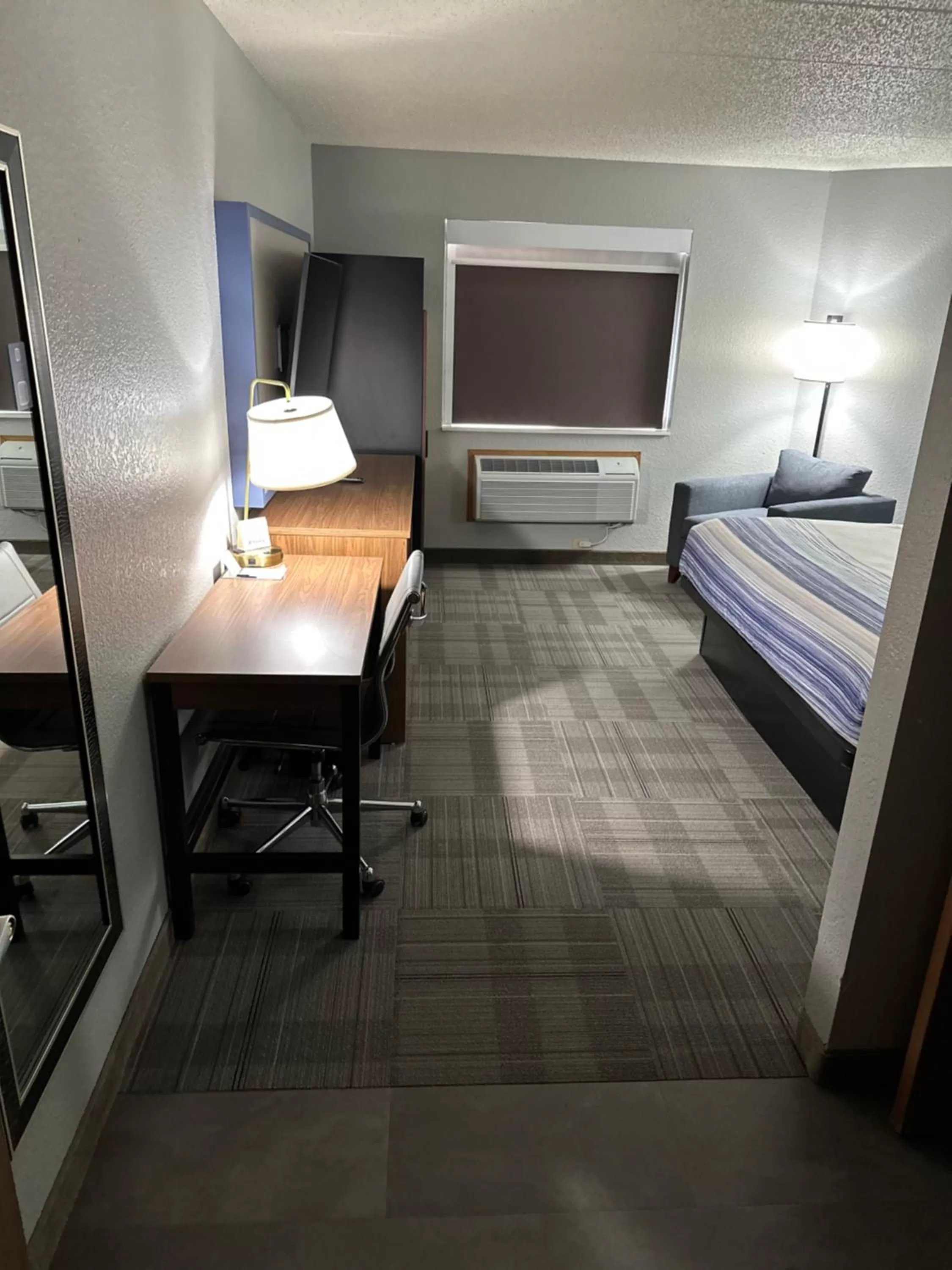 Photo of the whole room, Bed in AmericInn by Wyndham Monroe