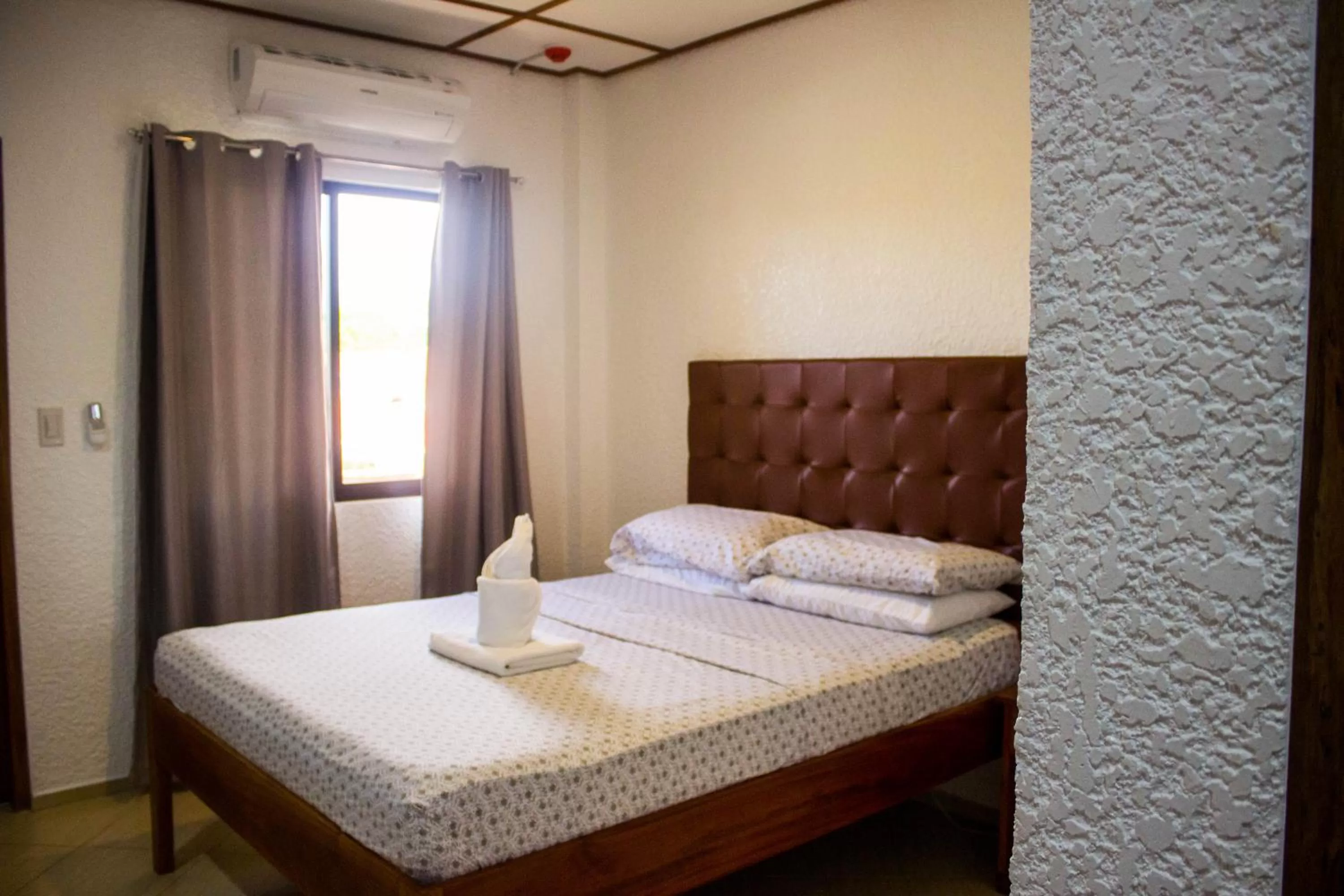 Bed in Jugalis Hotel and Restaurant