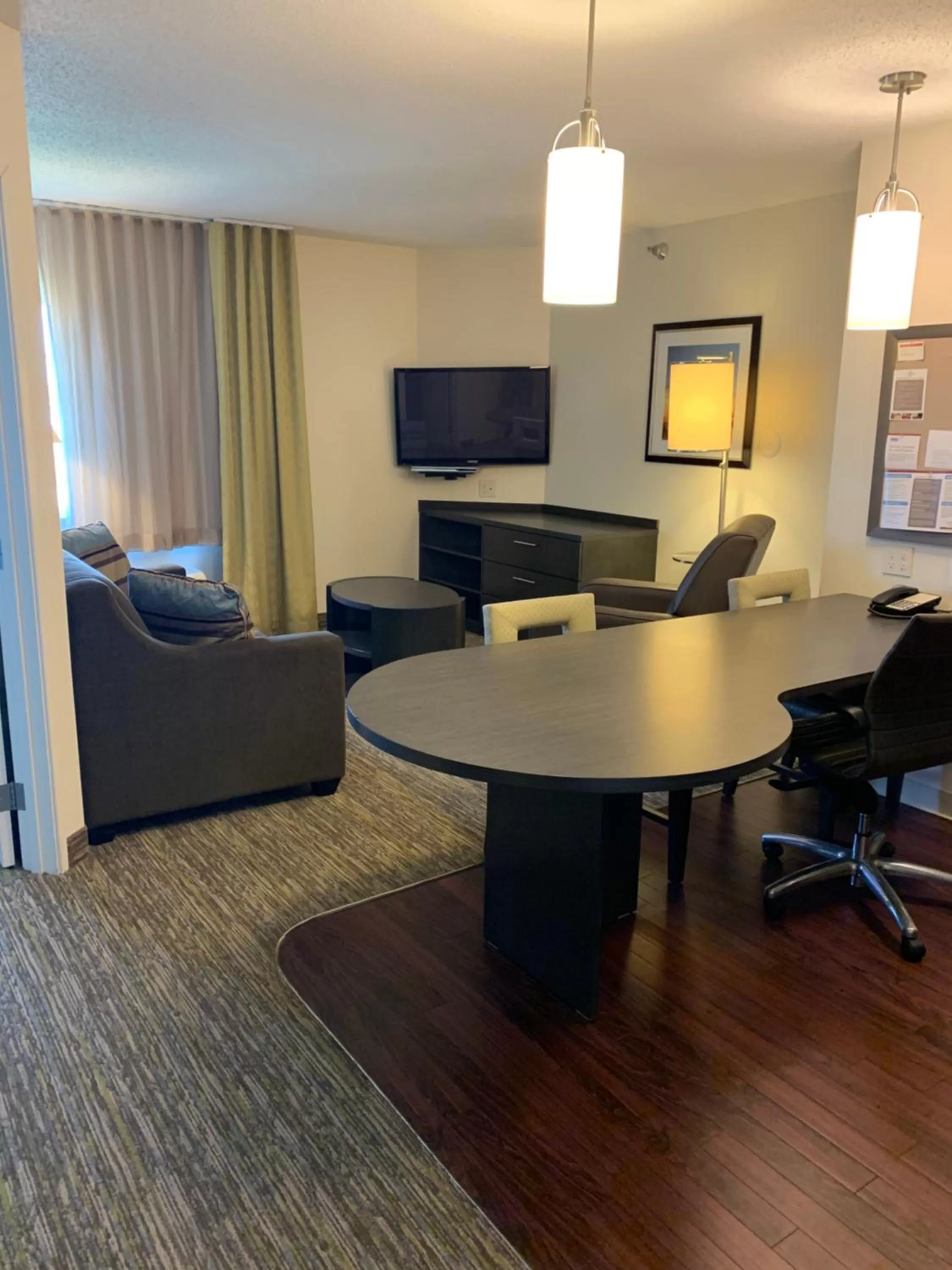 Living room in Candlewood Suites Fargo-North Dakota State University by IHG