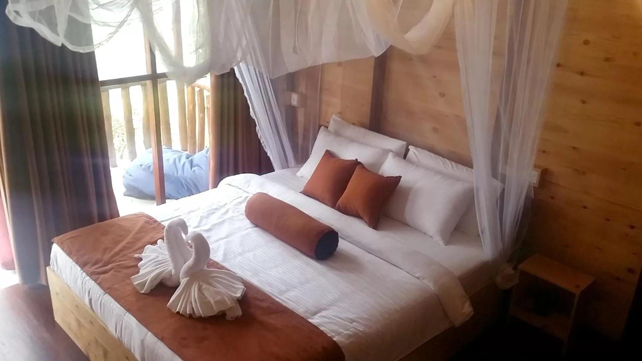 Bed in Saffron Eco Cottage