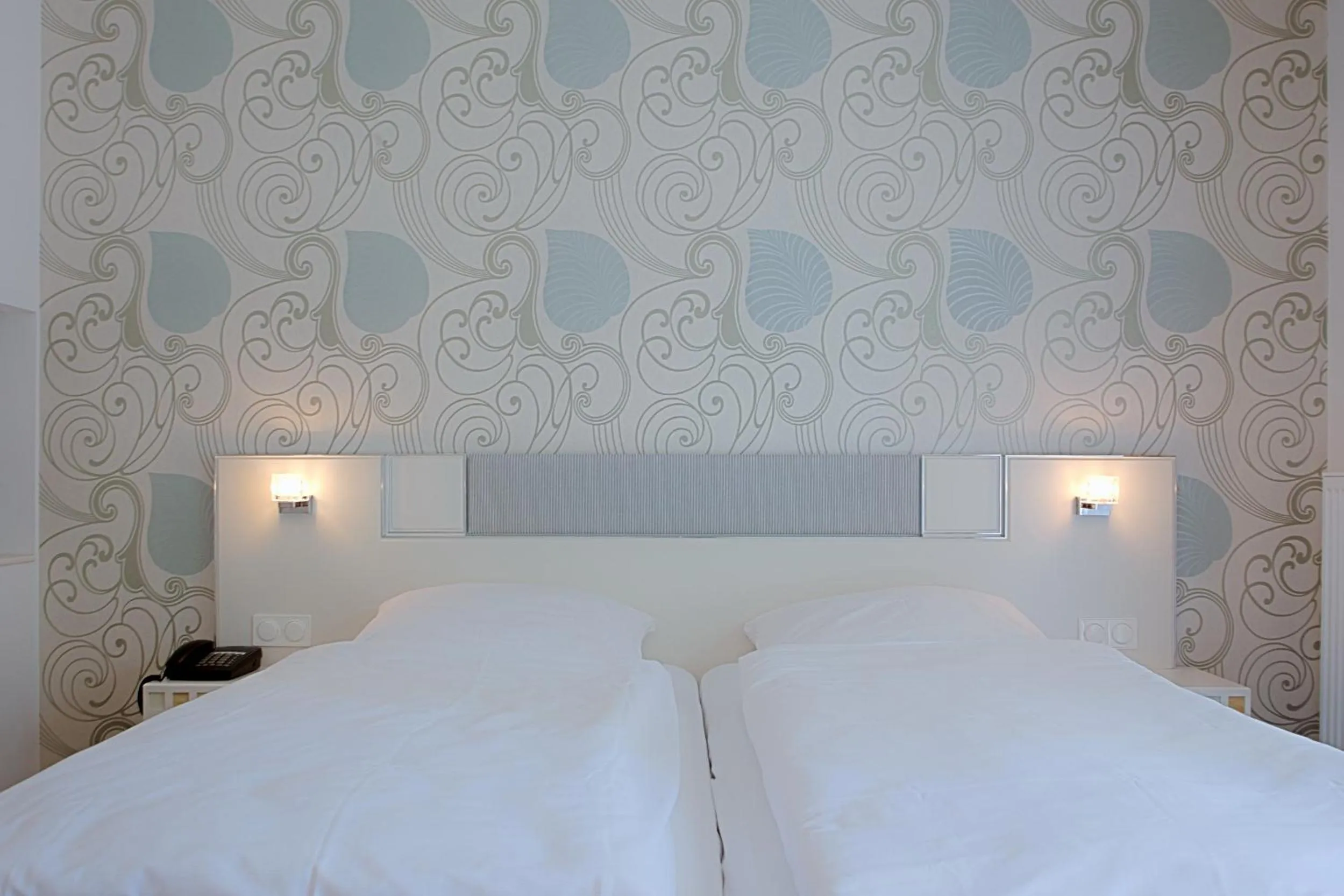 Photo of the whole room, Bed in Ringhotel Strandblick