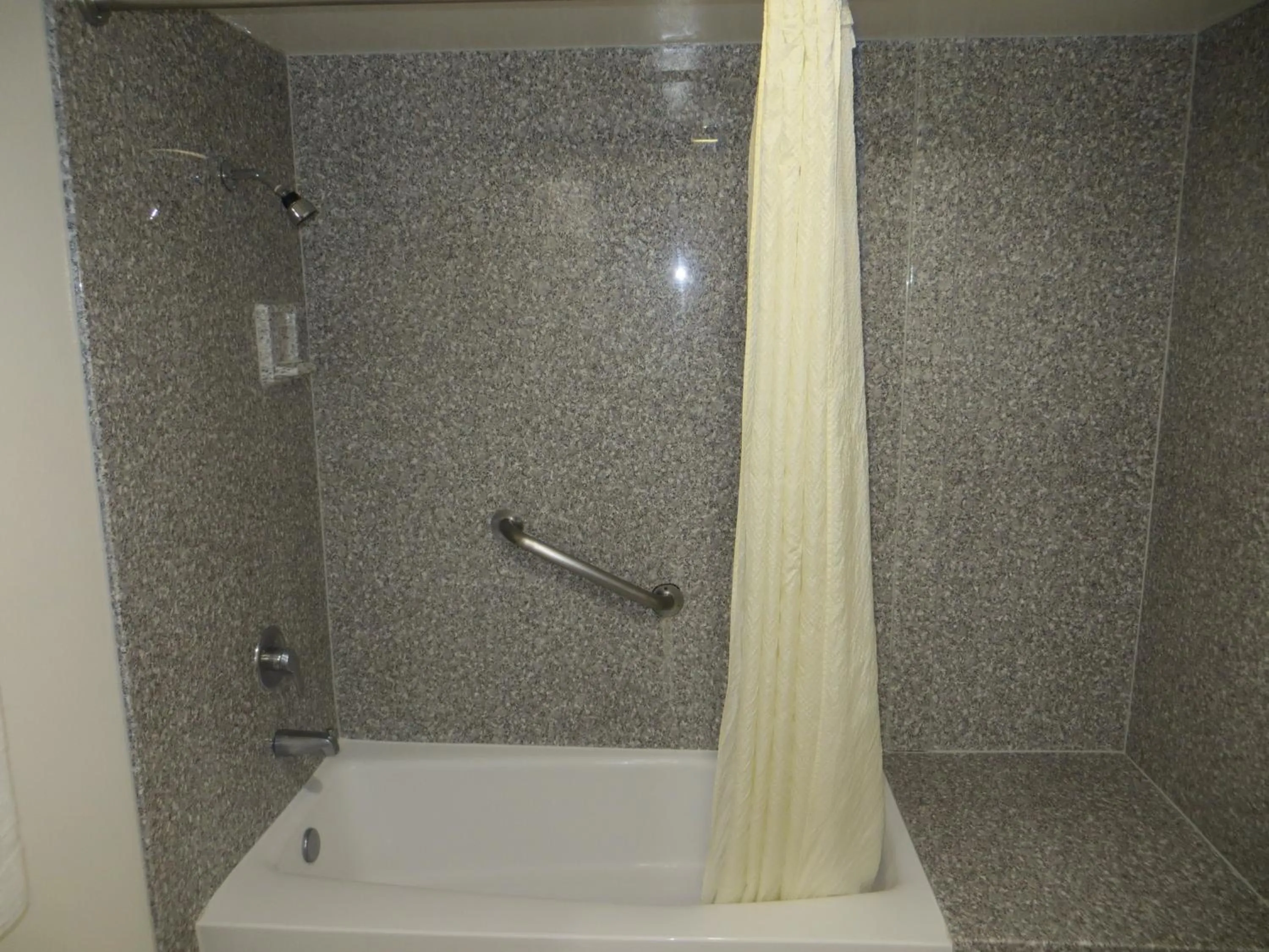 Bathroom in Riverside Inn & Suites