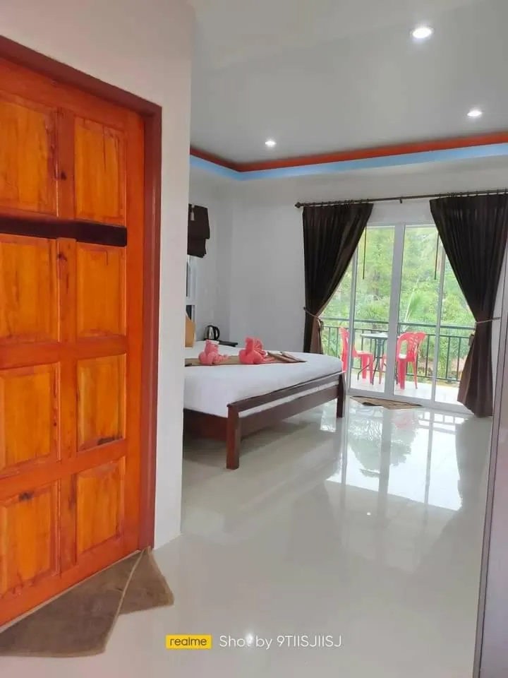 Bed in Tamarind Twin Resort