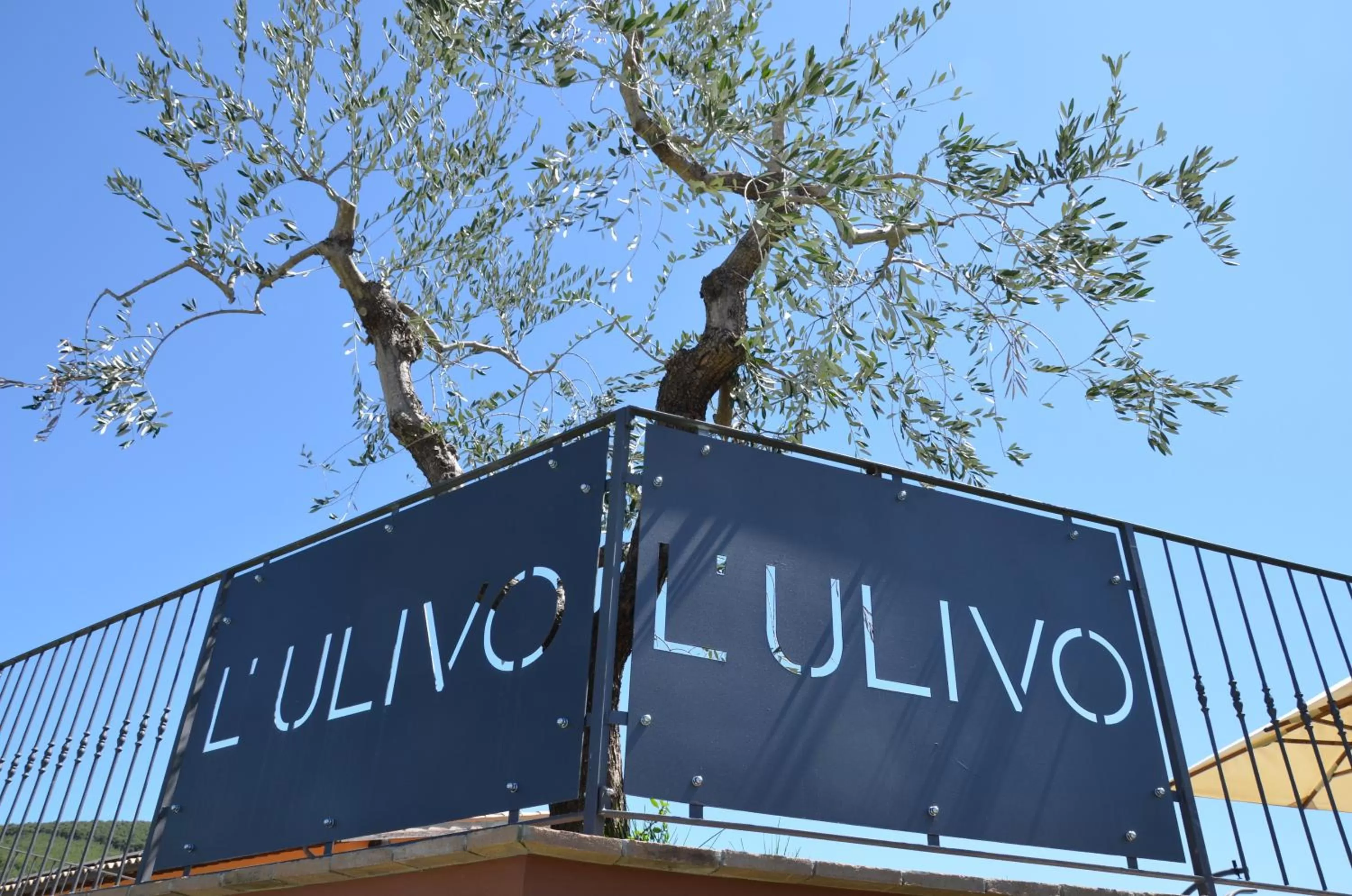 Property logo or sign in Il Borgo Dell'Ulivo