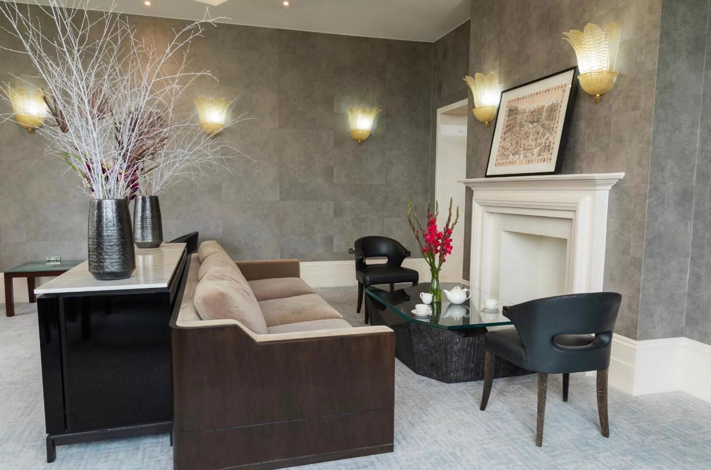 Communal lounge/ TV room in The Chatsworth Hotel