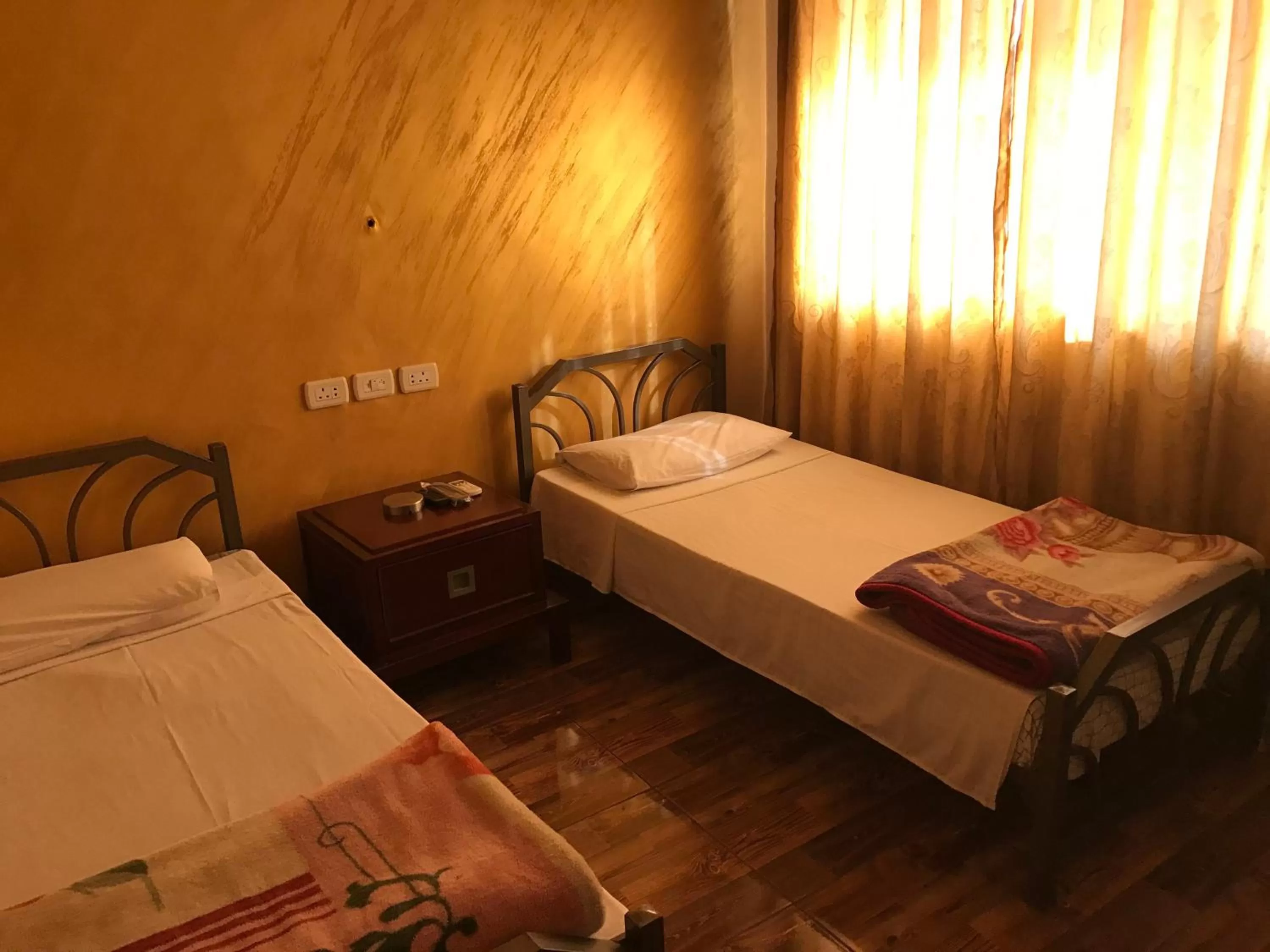 Bed in Sun Rise Hotel & Hostel & Tours