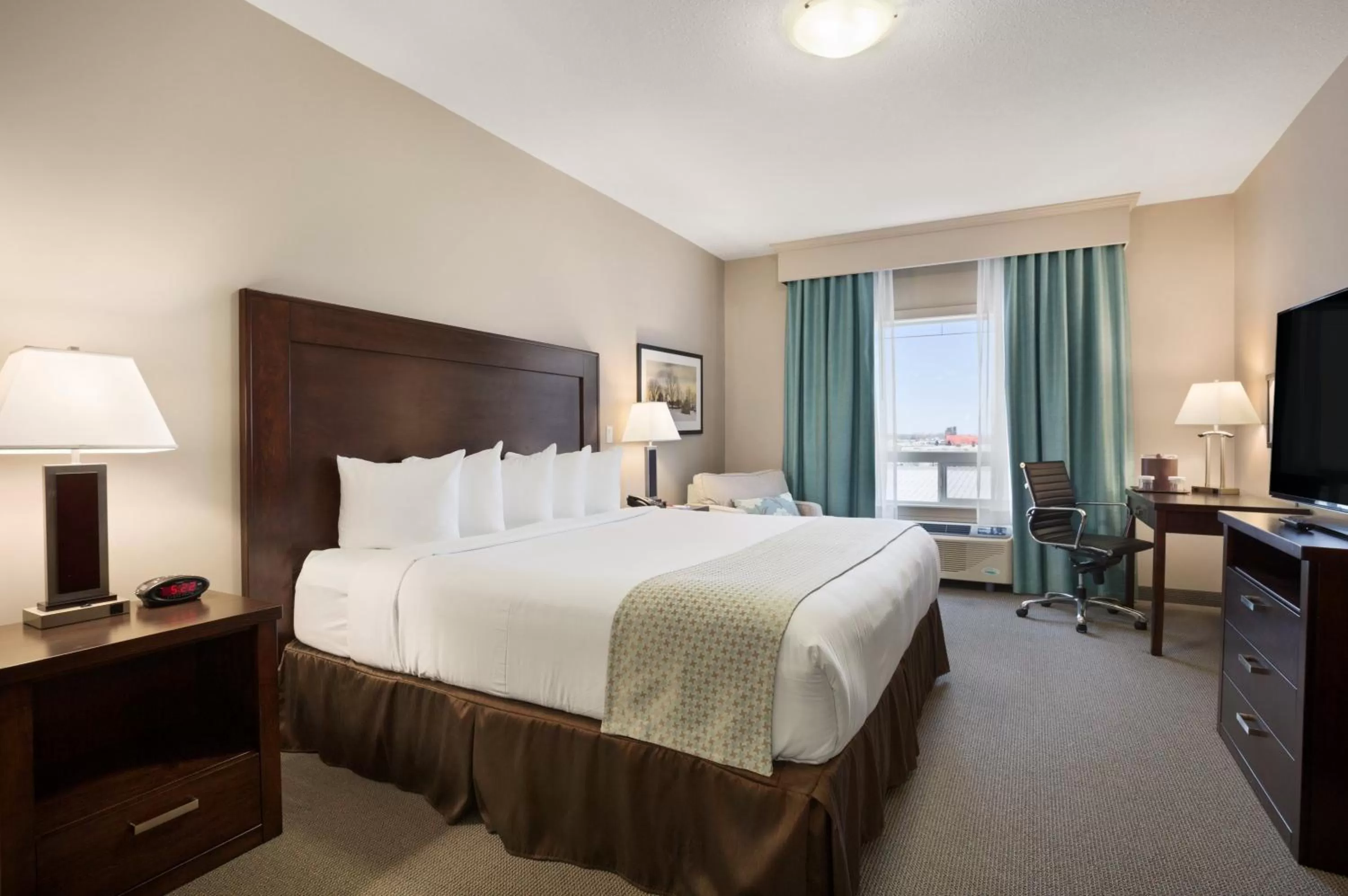 Bed in Ramada by Wyndham Emerald Park/Regina East
