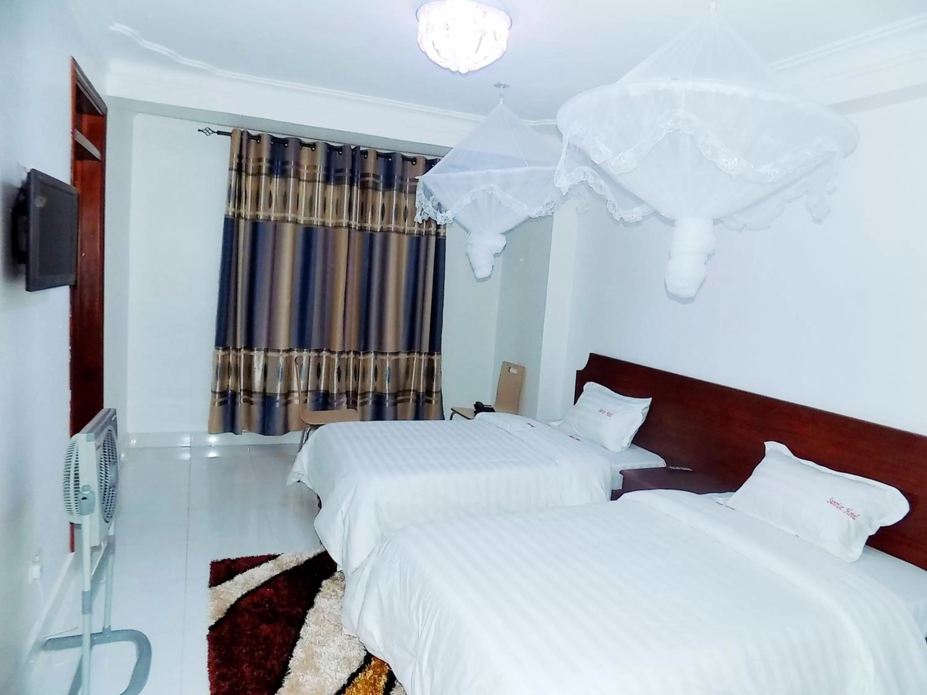 Bed in Sunrise Hotel Kampala