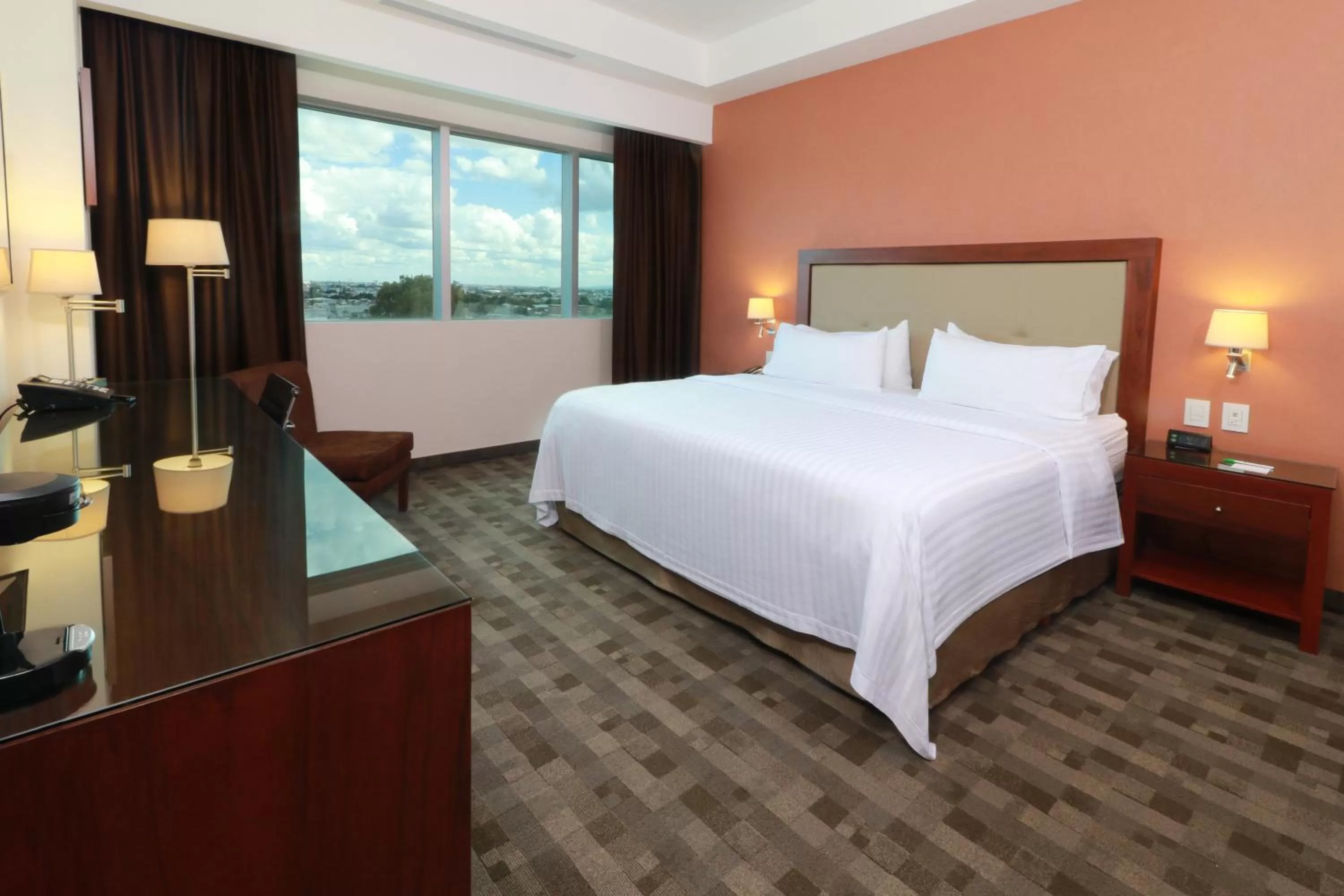 Photo of the whole room, Bed in Holiday Inn & Suites Plaza Mayor by IHG