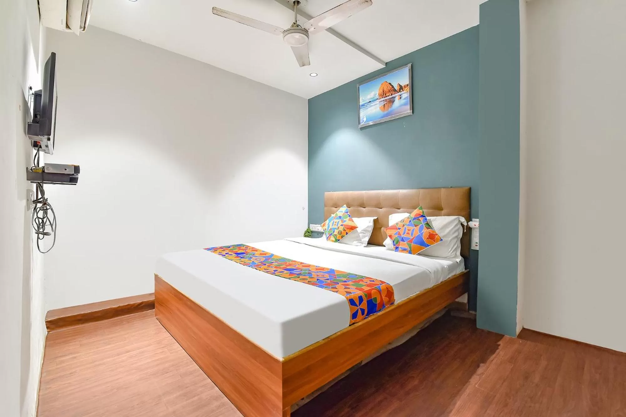 Bed in FabHotel Nidhivan, Udhna Junction