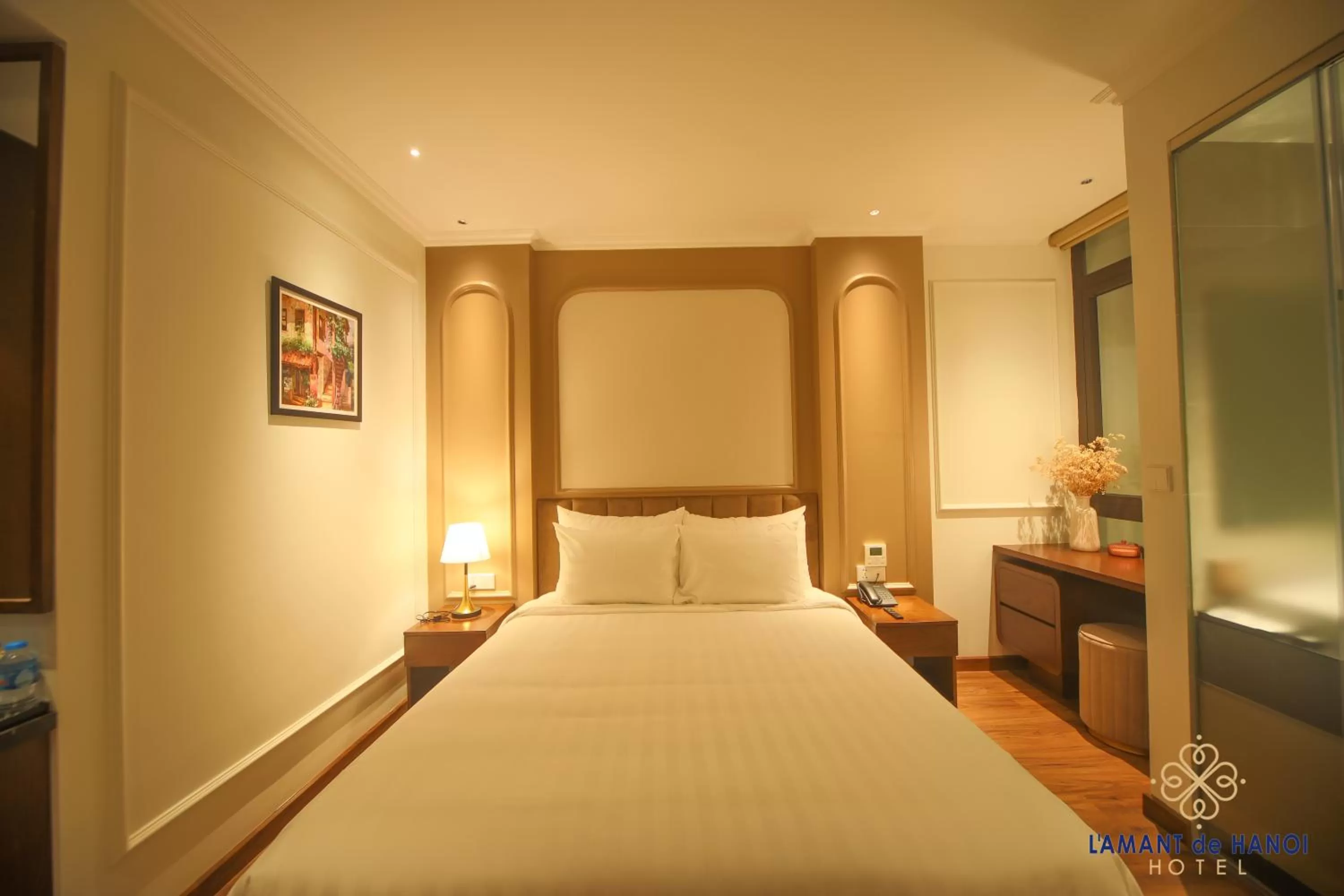 Bed in L'amant de Hanoi Hotel - khách sạn Lamant de Hà Nội