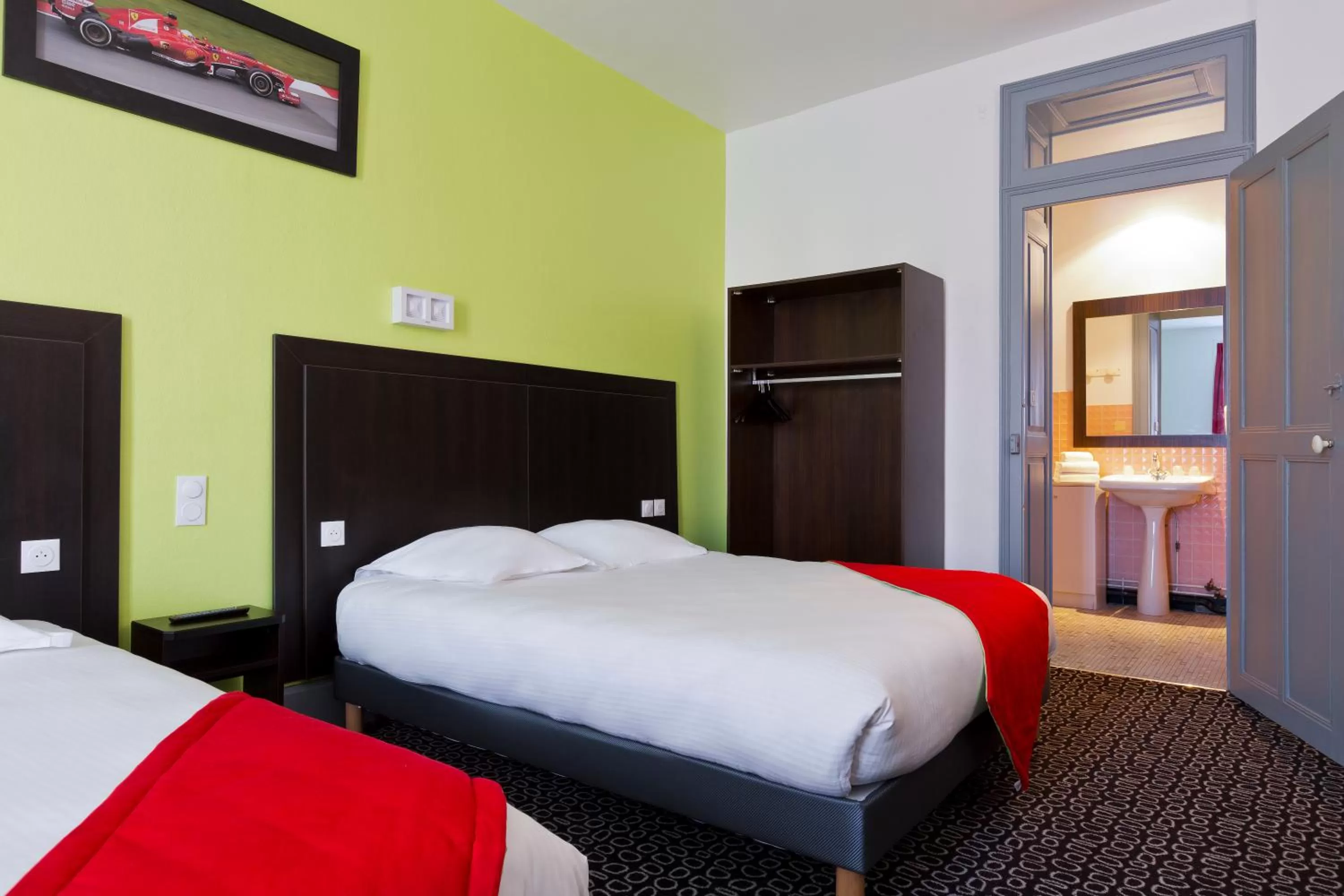 Bed in Enzo Hotels Contrexeville