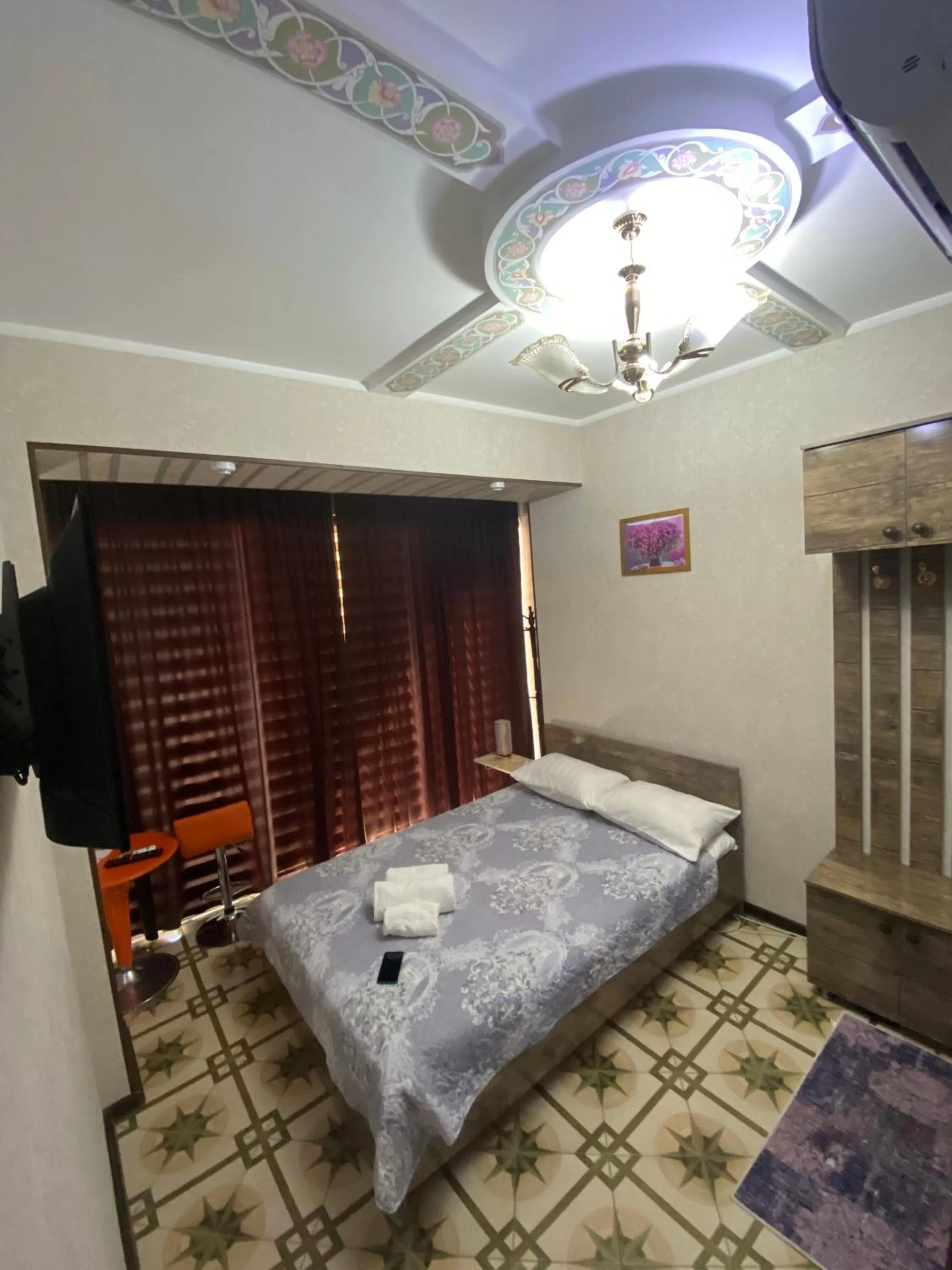 Bed in HOTEL UZBEGIM
