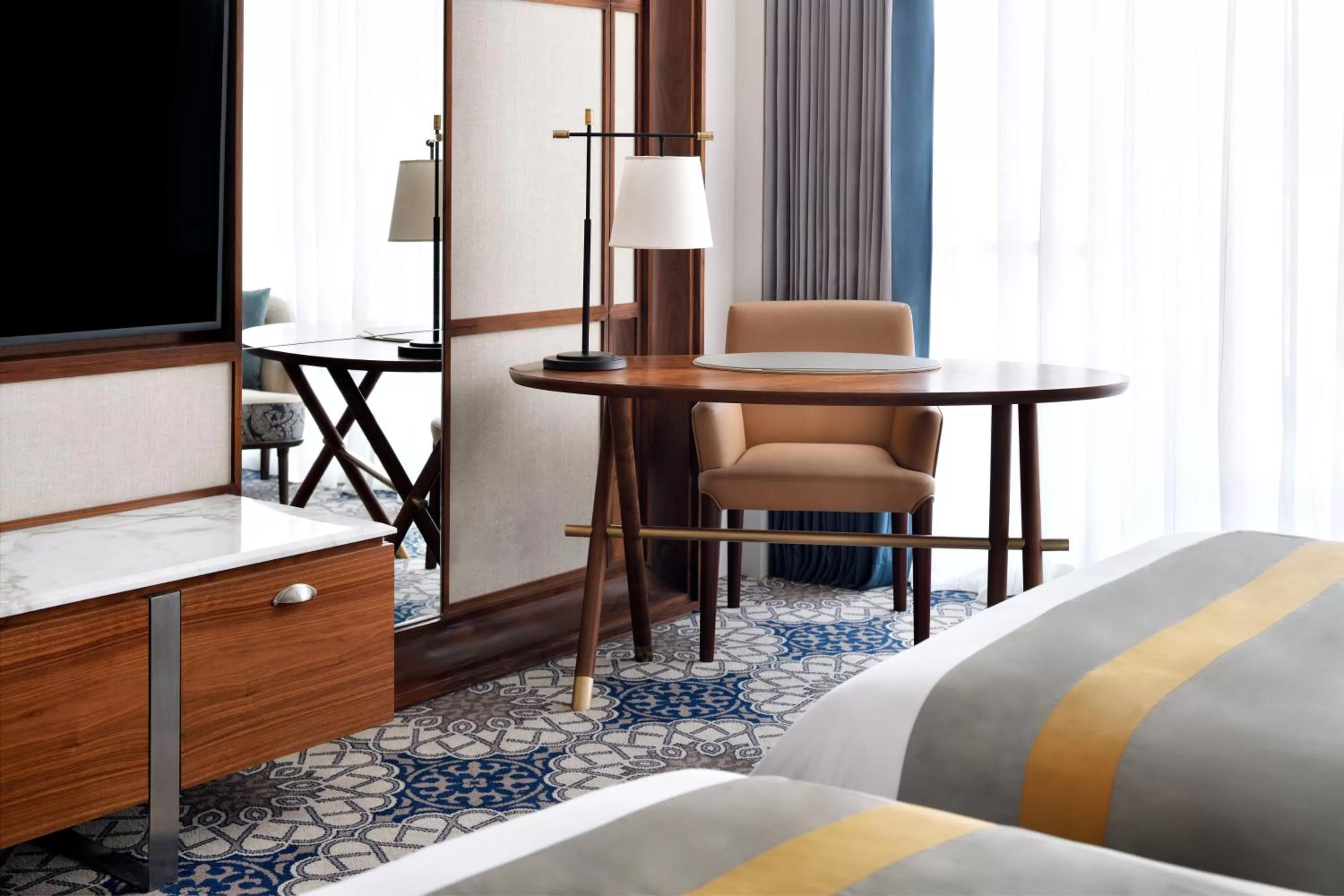 Seating area, Bed in Grand Plaza Mövenpick Media City