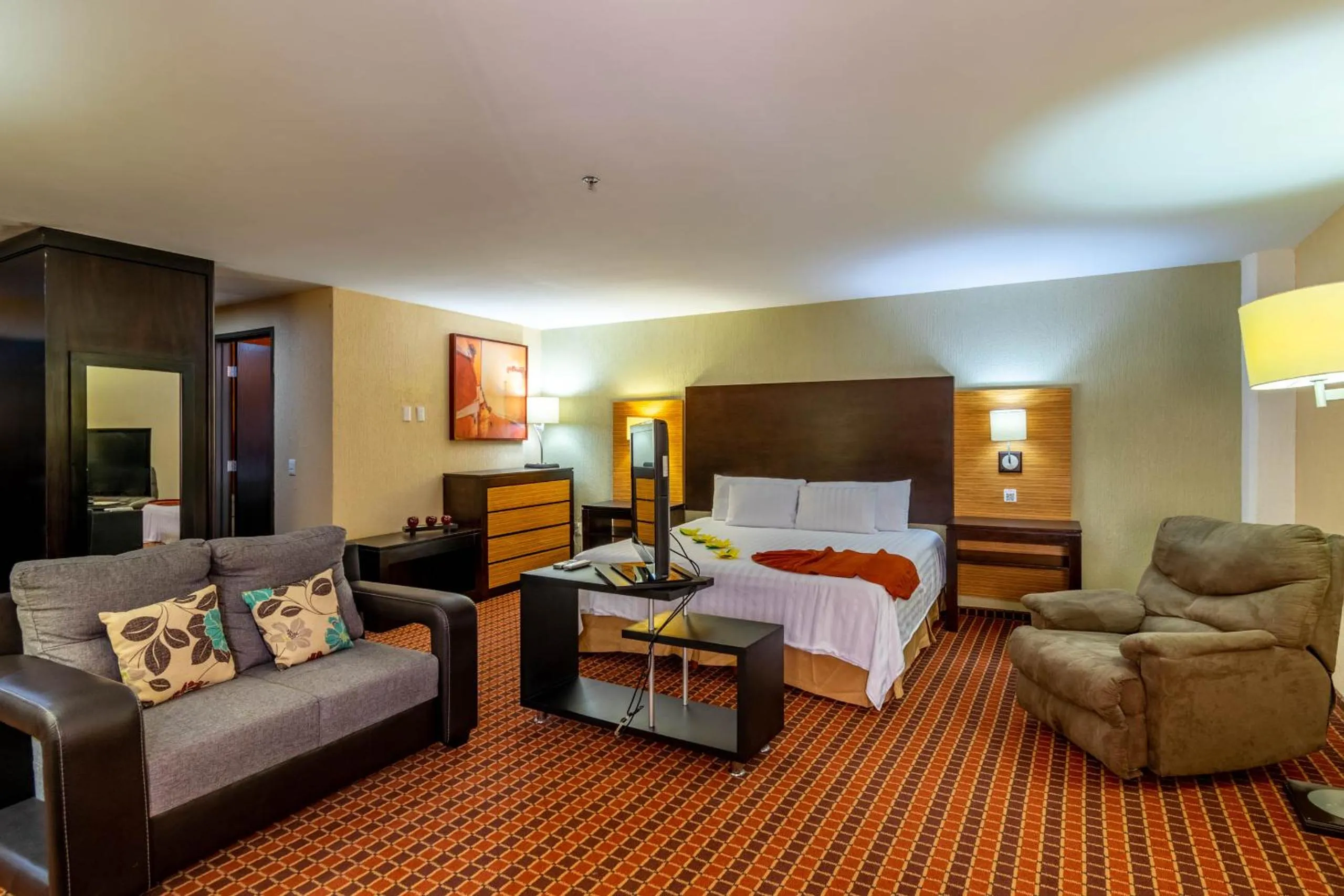 Living room, Bed in Paris FC Hotel