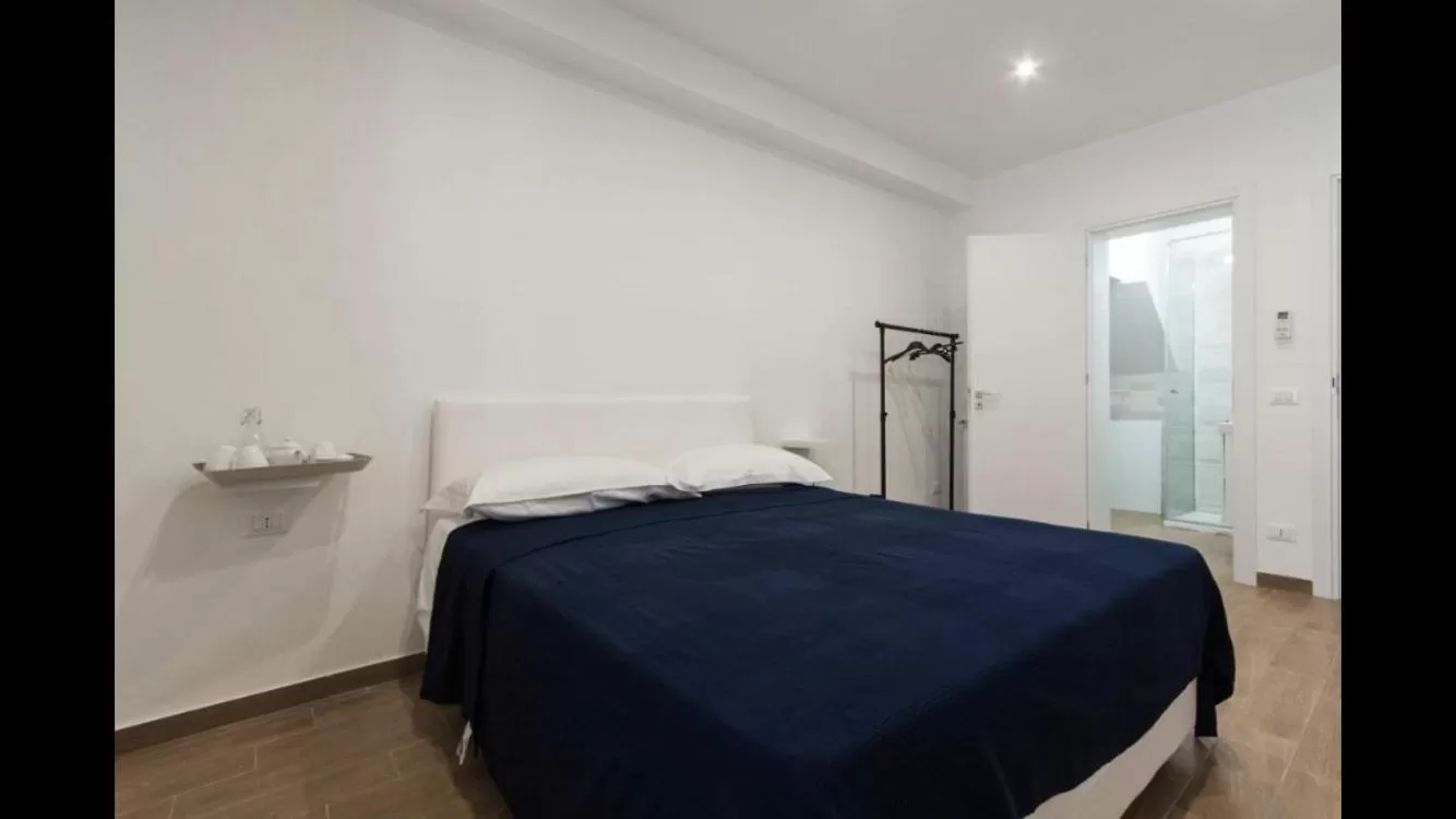 Bed in Verdirooms158