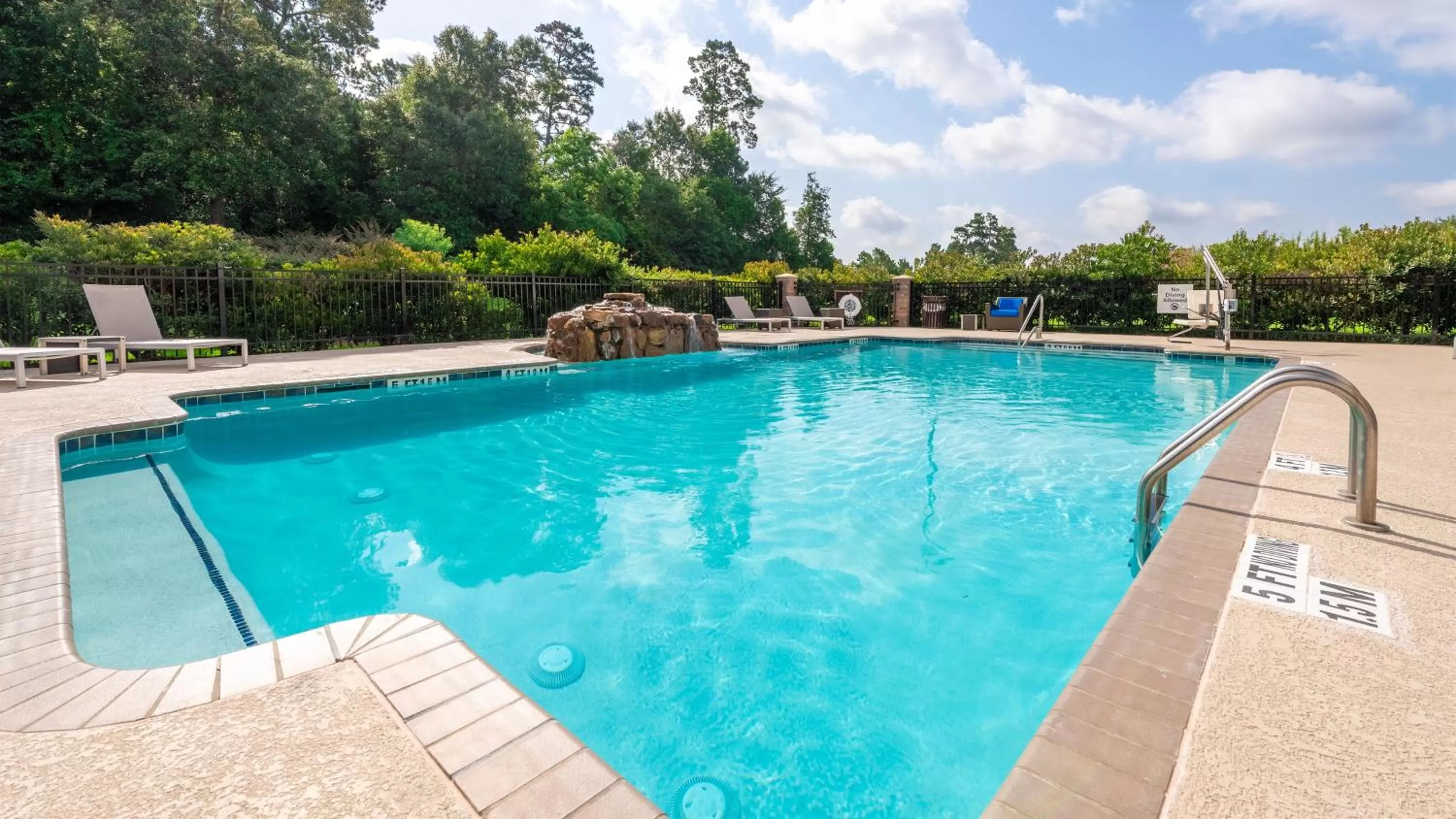 Swimming pool in Holiday Inn Express Hotel and Suites Conroe by IHG