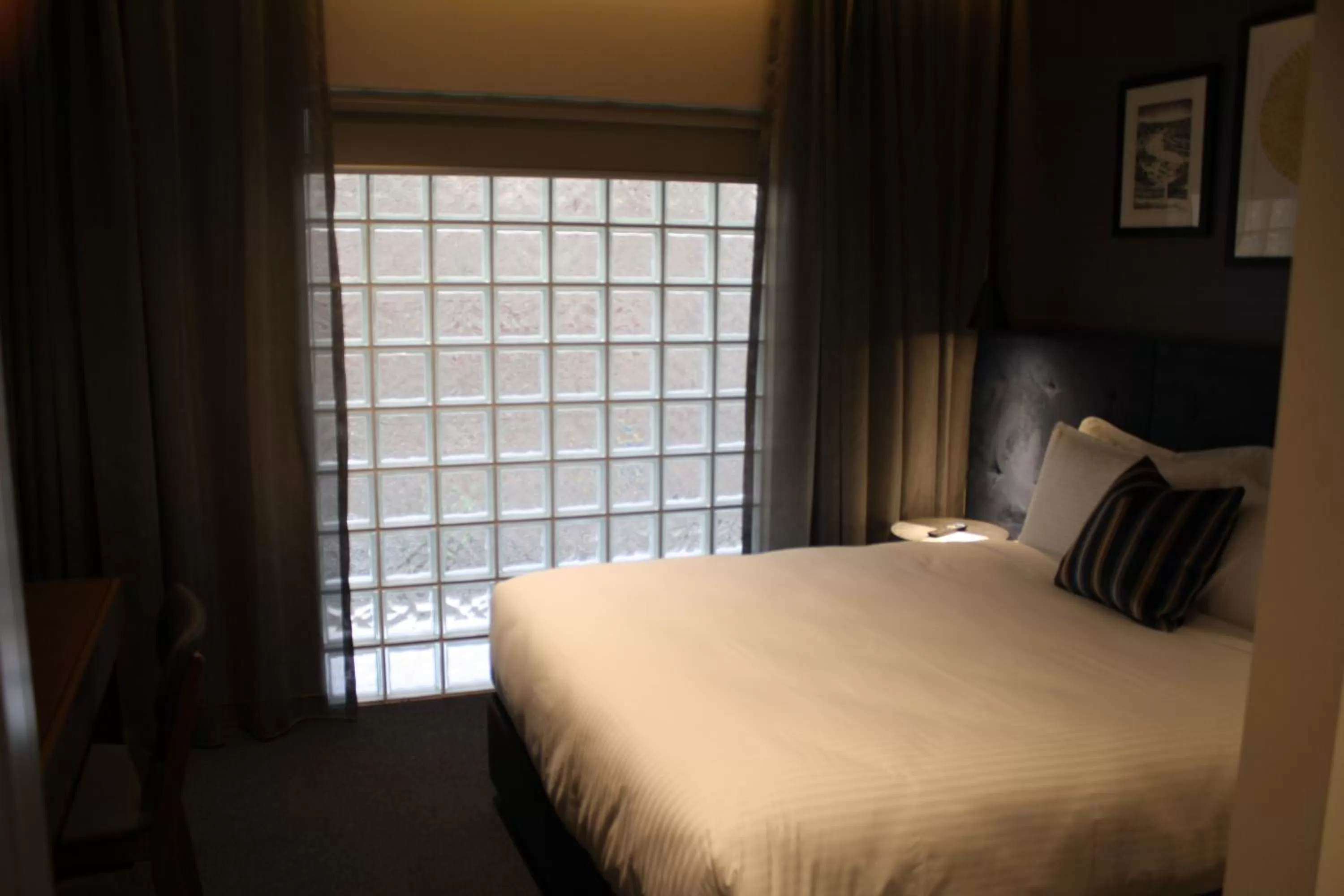 Bed in Mrs Banks Hotel