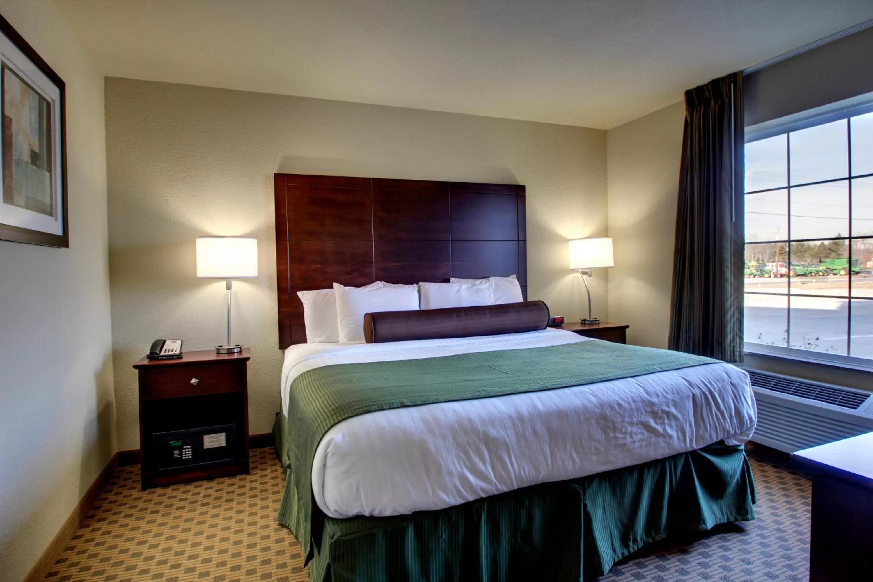 Bed in Cobblestone Hotel & Suites - Newton